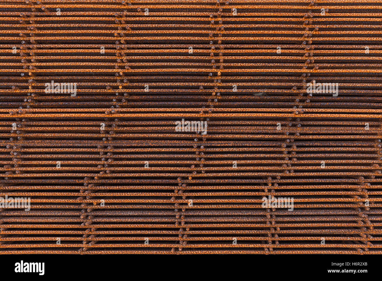 Abstract background industriale, stack di arrugginita di rinforzo degli elementi a maglia Foto Stock