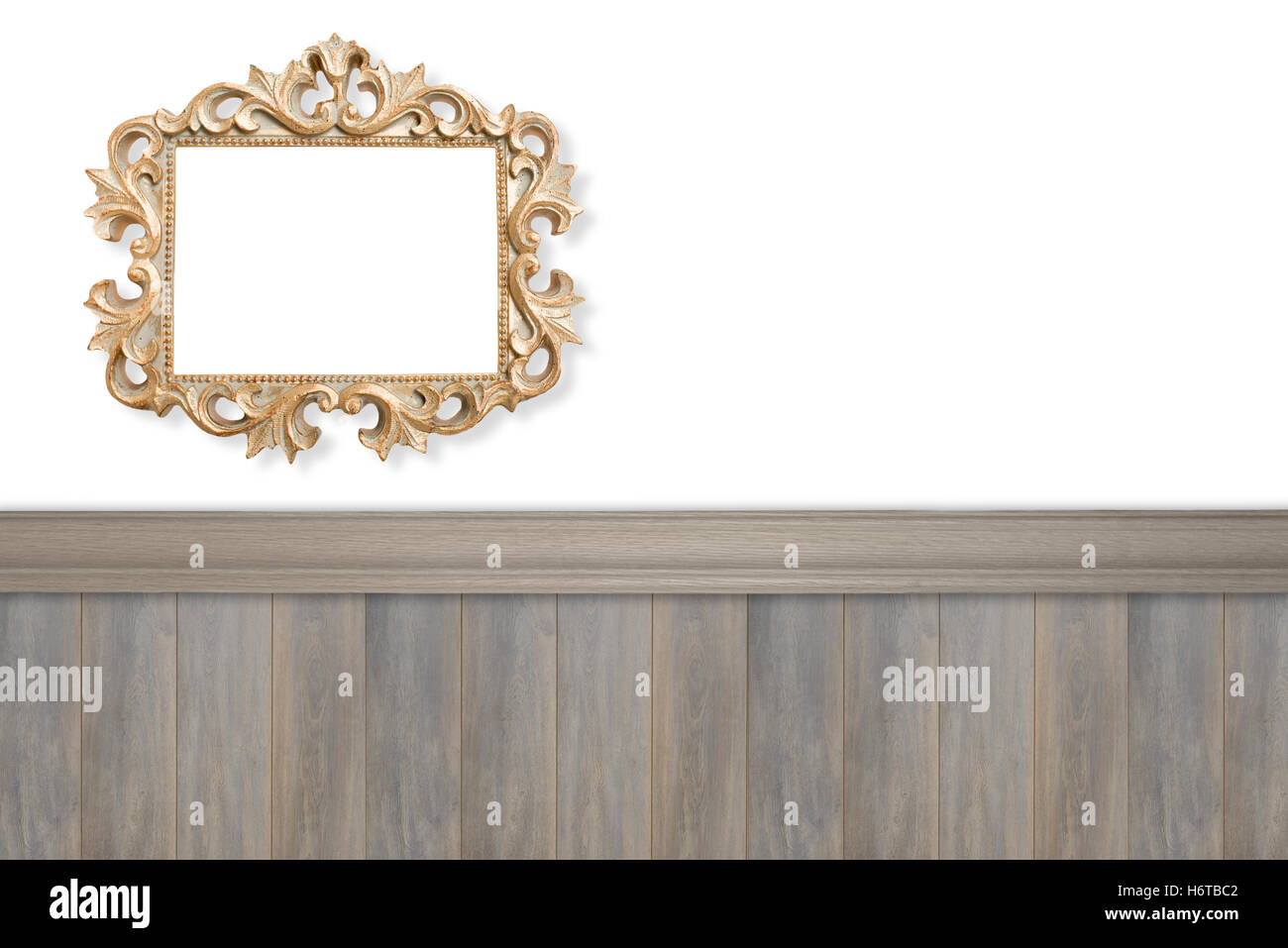 Spazio pubblicitario ornato cornice dorata e pannello in legno parete Foto Stock