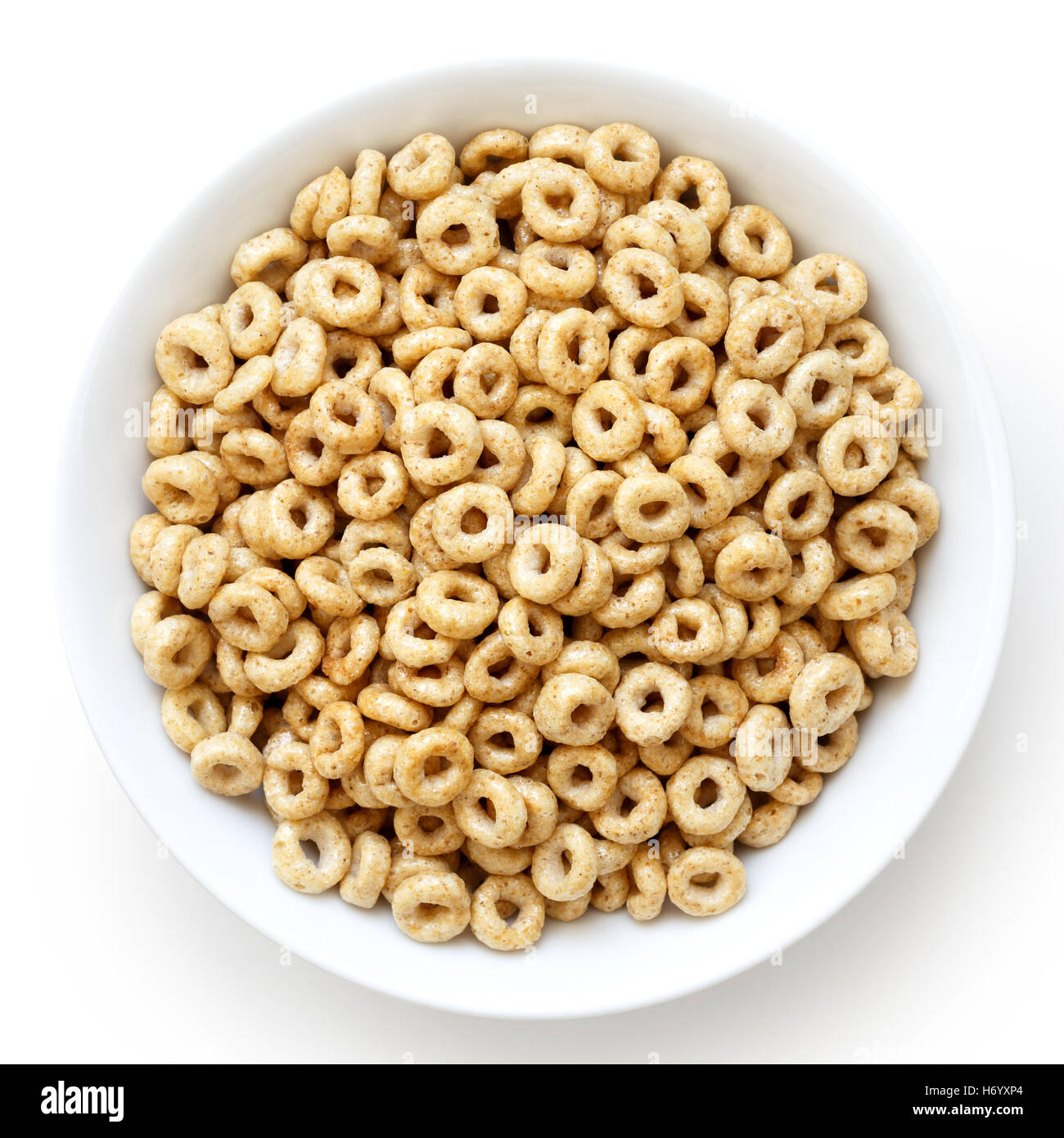 Ciotola di miele cheerios isolato su bianco dal di sopra. Foto Stock