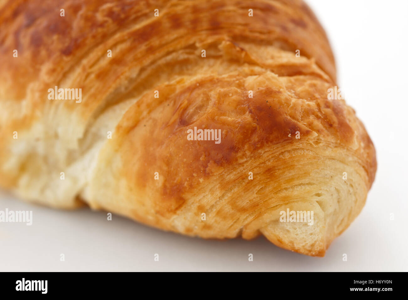 Macro dettaglio di una estremità di un croissant pasticceria Foto Stock