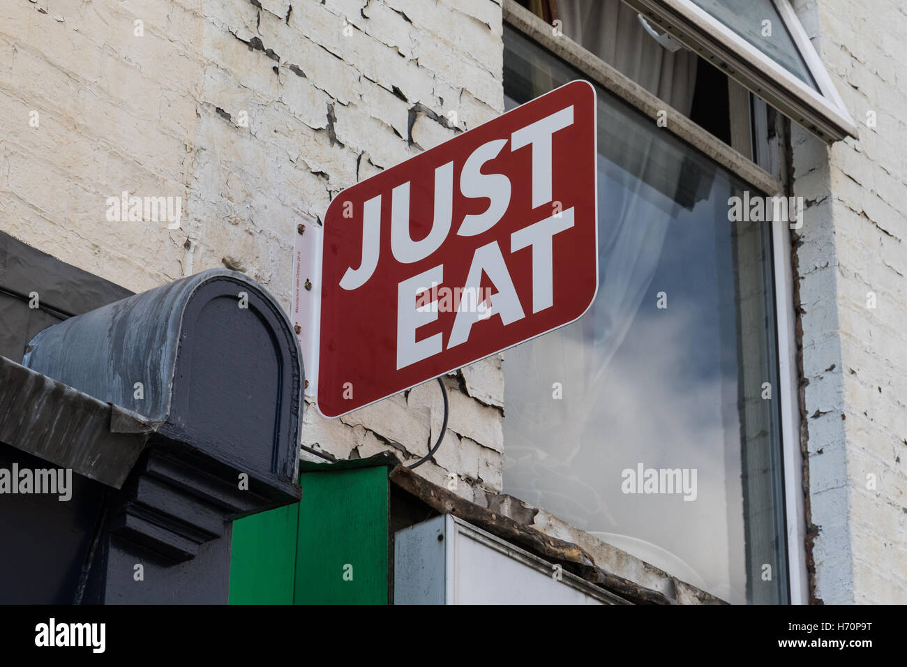 Solo mangiare segno. Solo mangiare è un servizio online di ordine alimentare e del servizio di consegna. Foto Stock
