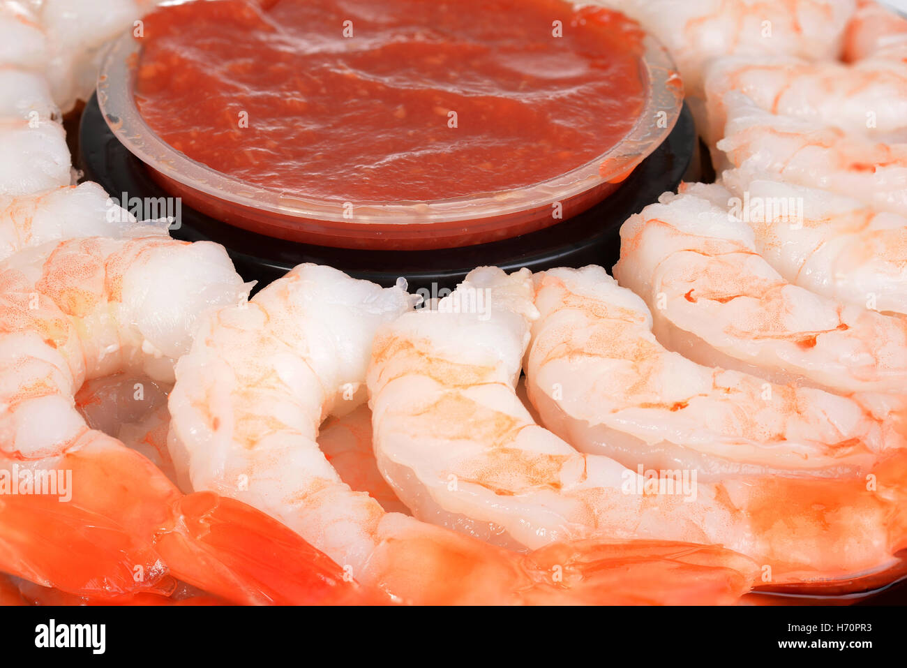 Macro gamberi grandi con salsa di frutti di mare Foto Stock