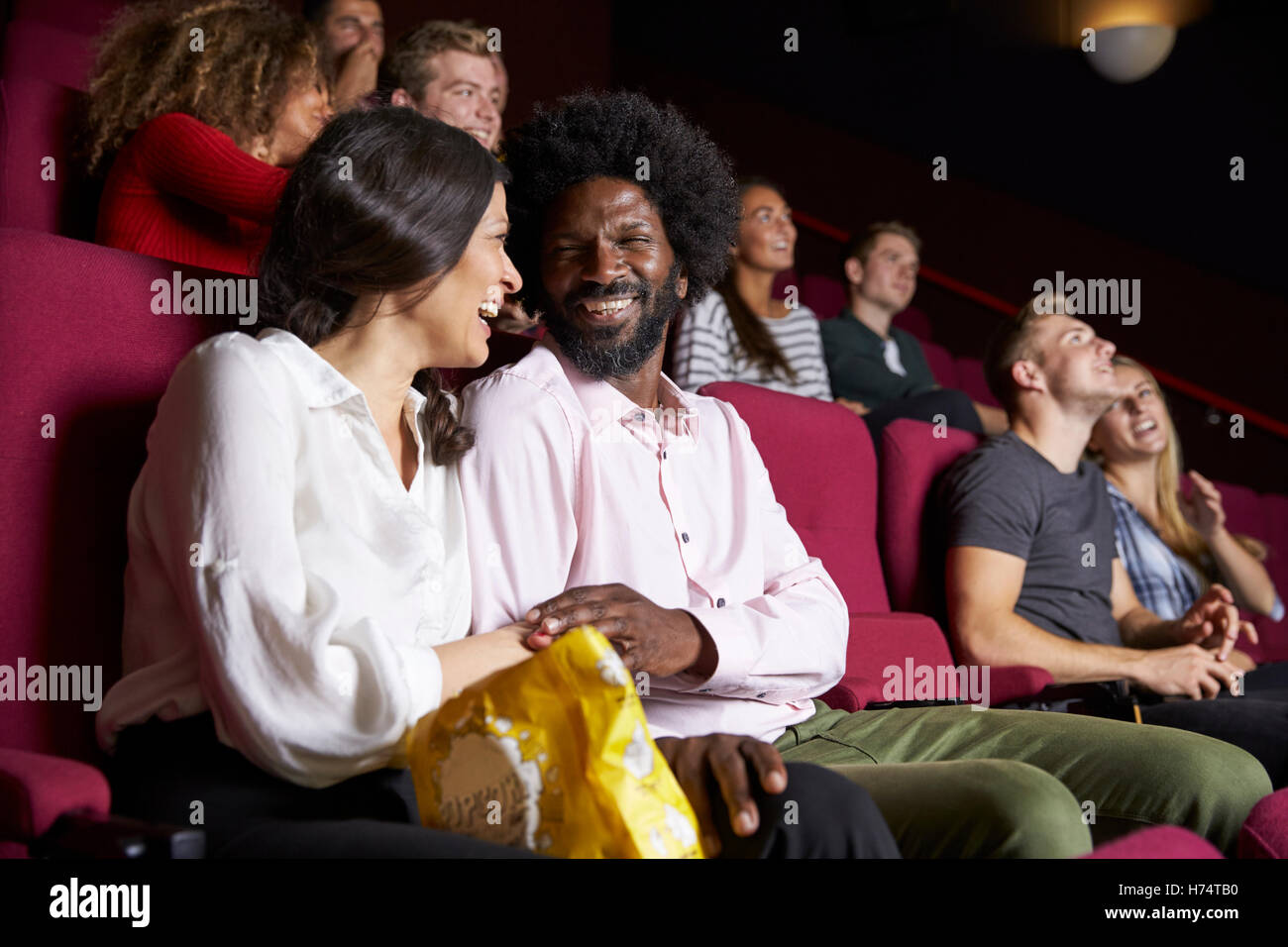 Matura in cinema guarda la commedia film Foto Stock