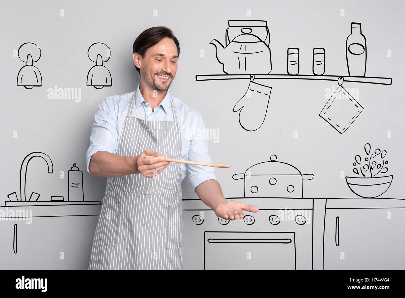 Gioioso piacevole uomo sorridente Foto Stock Gioioso piacevole uomo sorridente Foto Stock