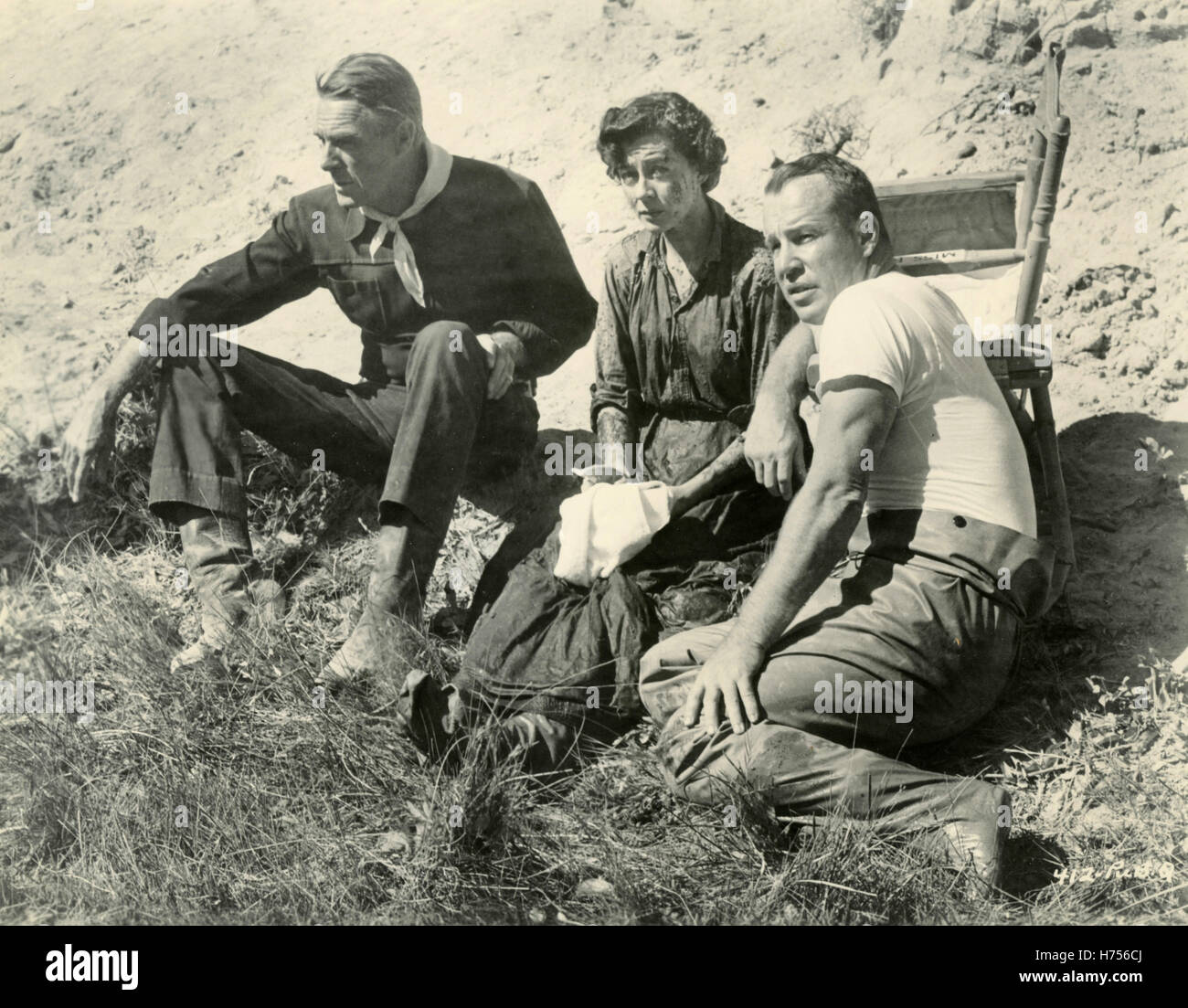 Attore americano Randolph Scott nel film sette uomini da ora, USA 1956 Foto Stock