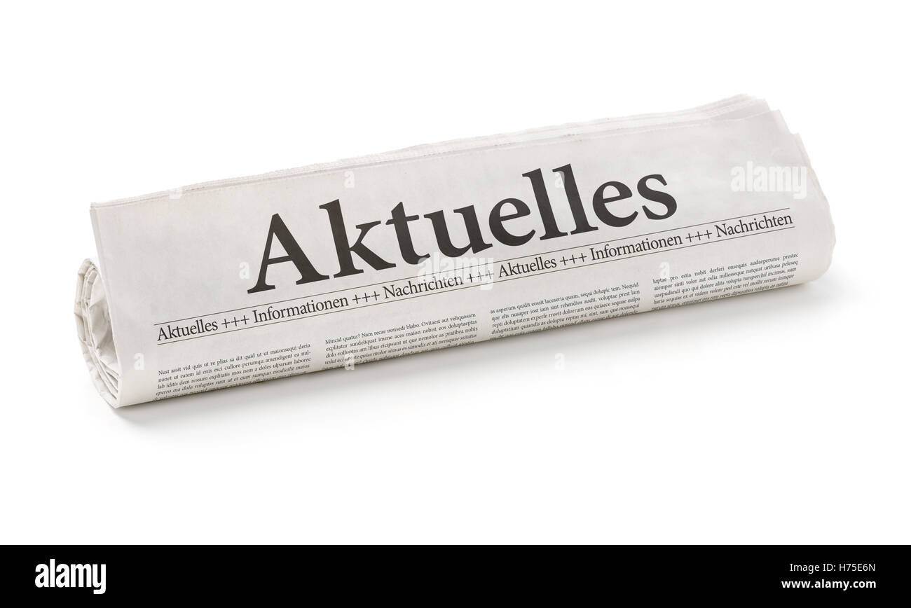 Rotolo di giornale con il titolo aggiornamenti Foto Stock