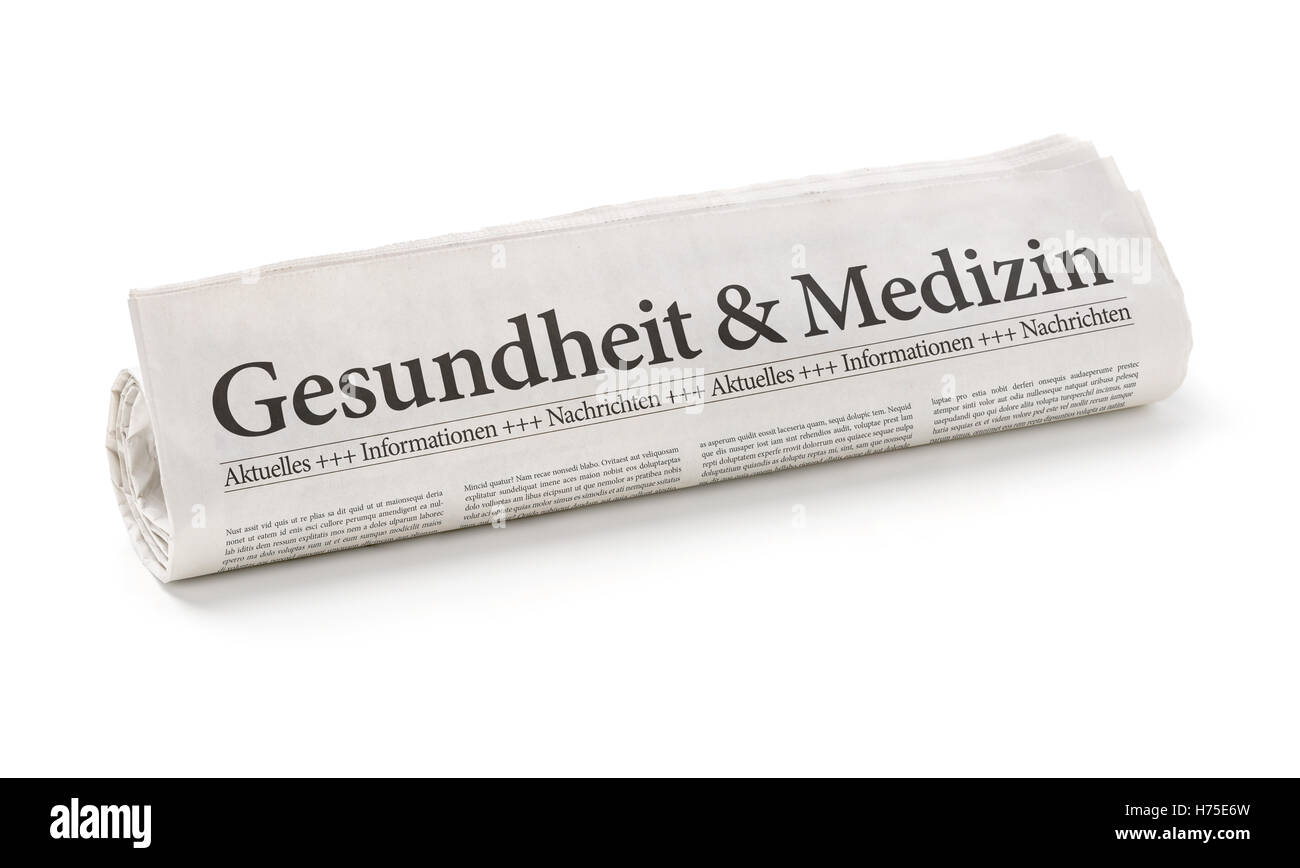 Giornale il rullo con la salute e medicina headline Foto Stock