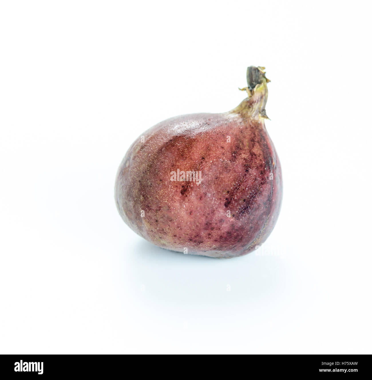 Mature dolce figura , frutta fresca su sfondo bianco Foto Stock