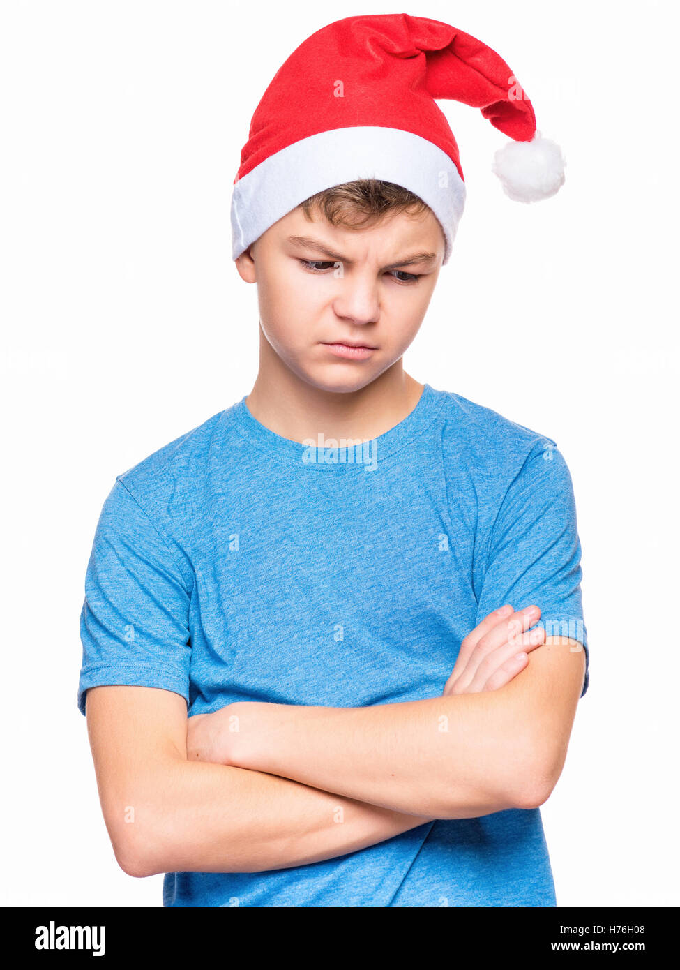 Teen boy indossando Santa Claus hat Foto Stock