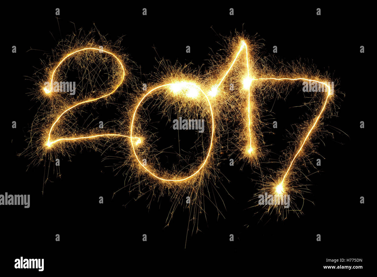 Anno Nuovo 2017 formata da scintille cifre su sfondo nero Foto Stock