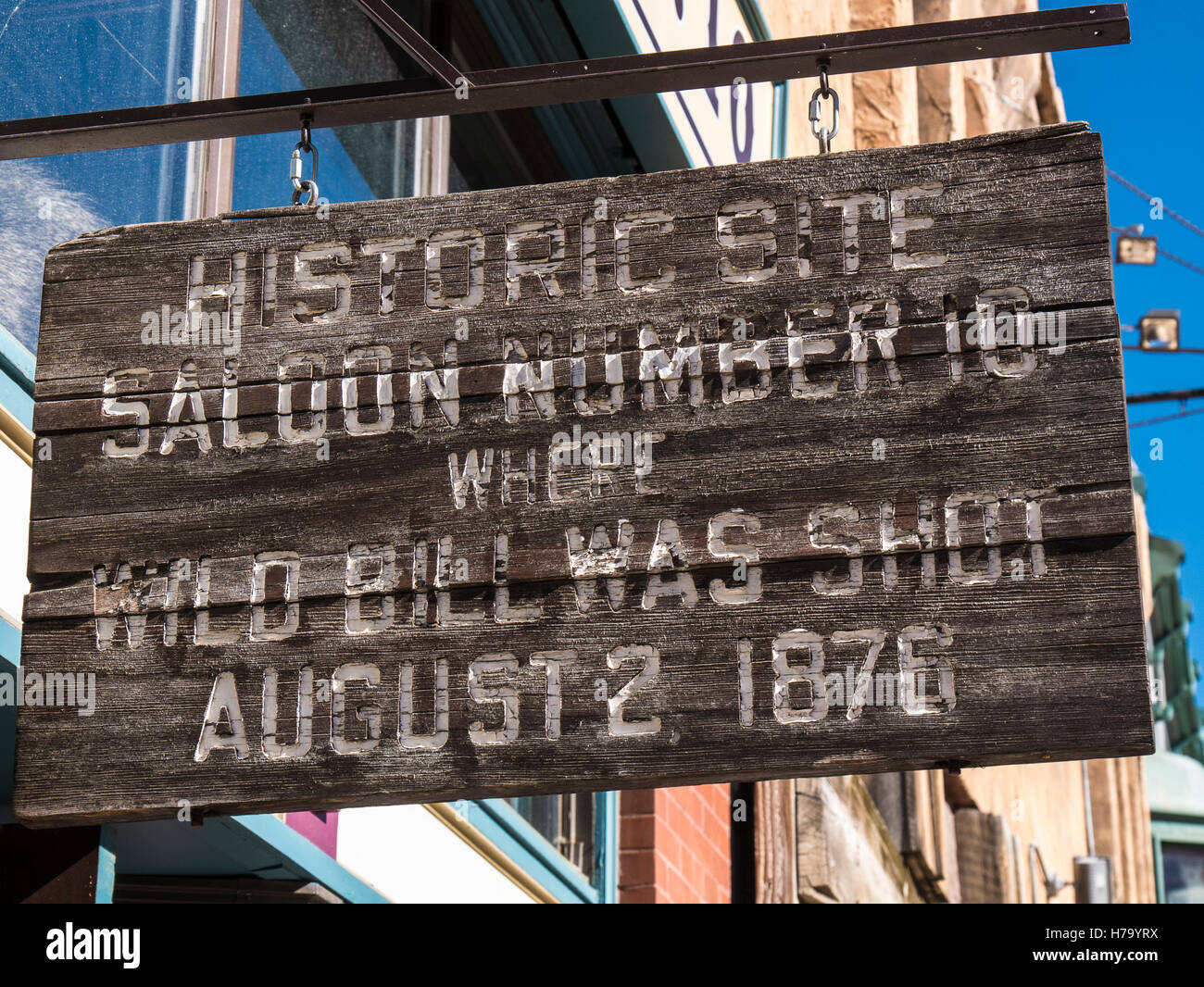 Wild Bill Bar salone ex numero 10 segno storico, inferiore Main Street, Deadwood, South Dakota. Foto Stock