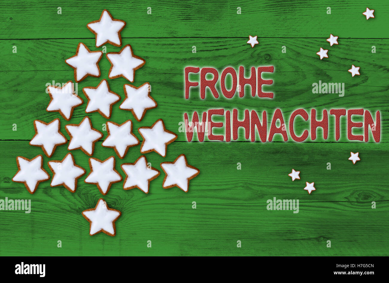 La cannella stelle albero di Natale Frohe Weihnachten (in tedesco Buon Natale) concetto. Foto Stock