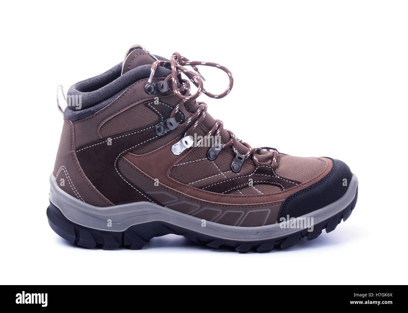 Escursionismo boot isolati su sfondo bianco Foto Stock