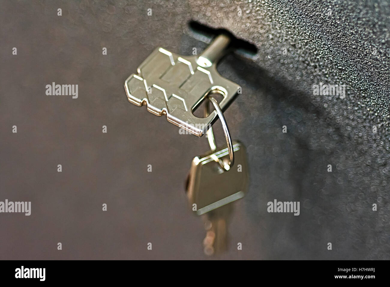 La chiave nella serratura Cassetta di sicurezza Foto stock - Alamy