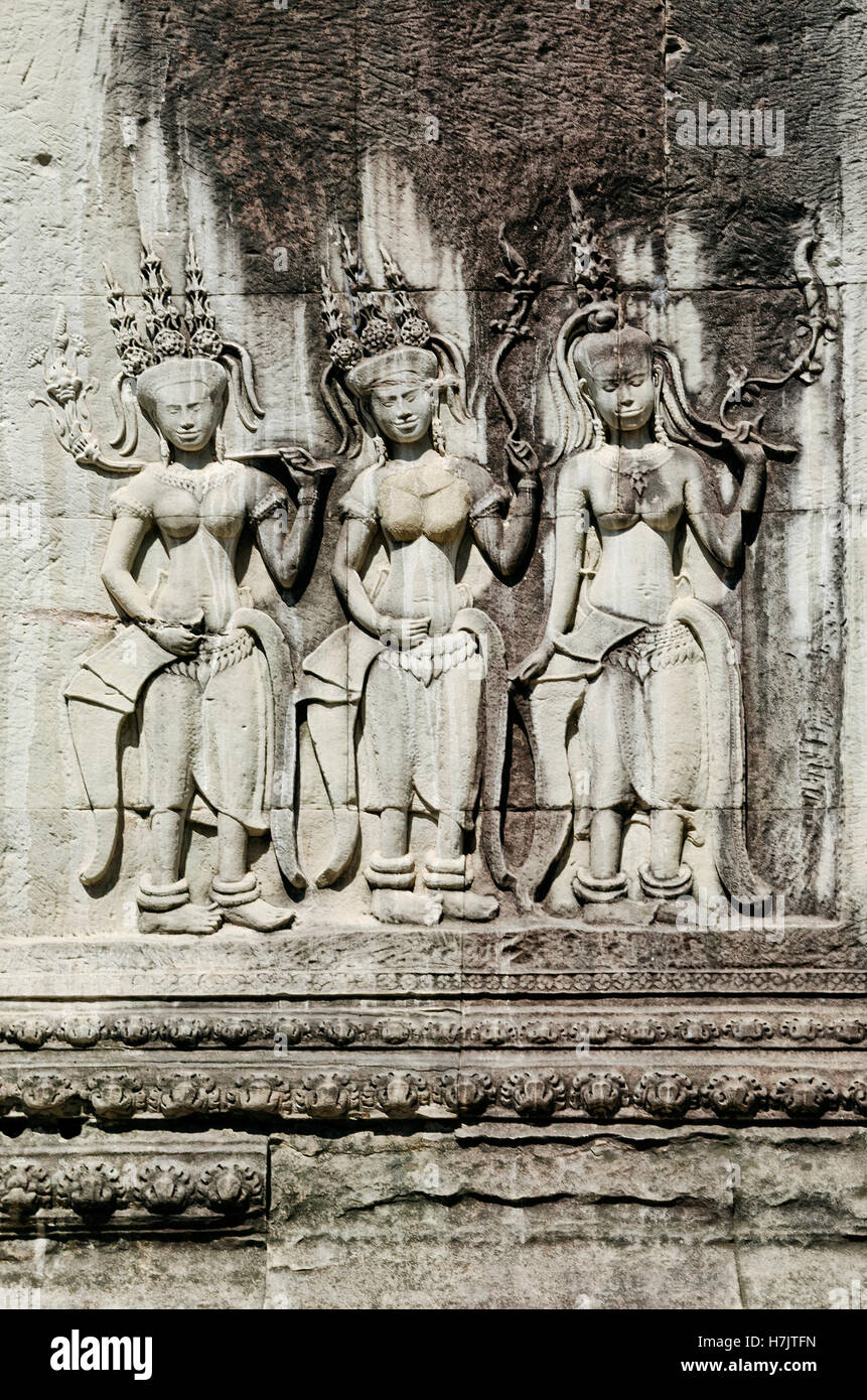 Antica pietra asiatici figure scolpite in buddista di Angkor Wat Cambogia Foto Stock