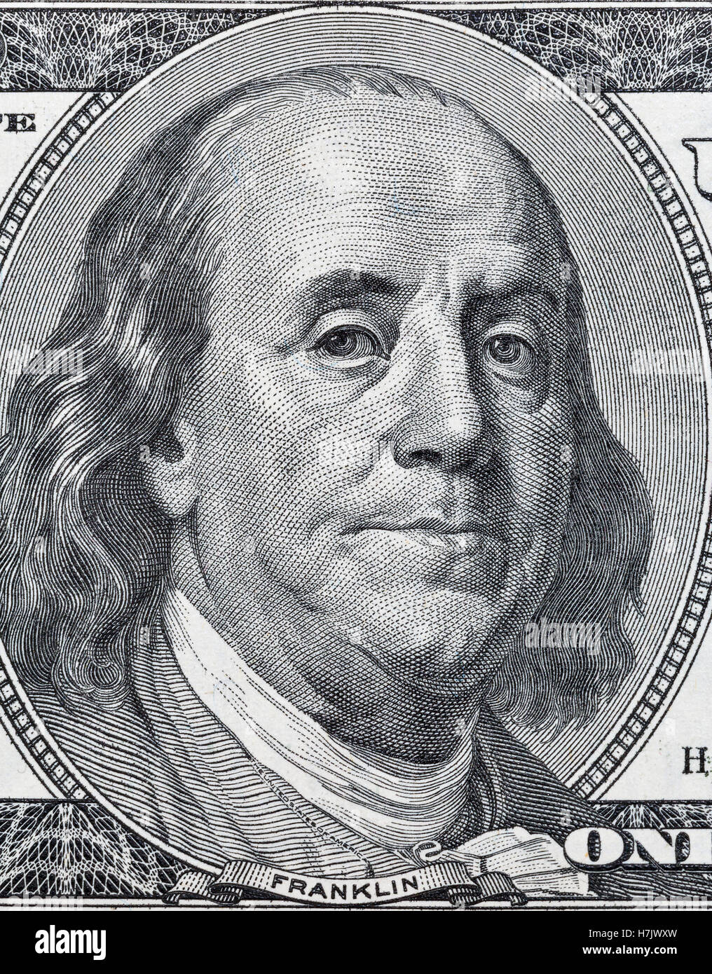 Il presidente statunitense Benjamin Franklin ritratto su un centinaio di dollari frammento macro Foto Stock