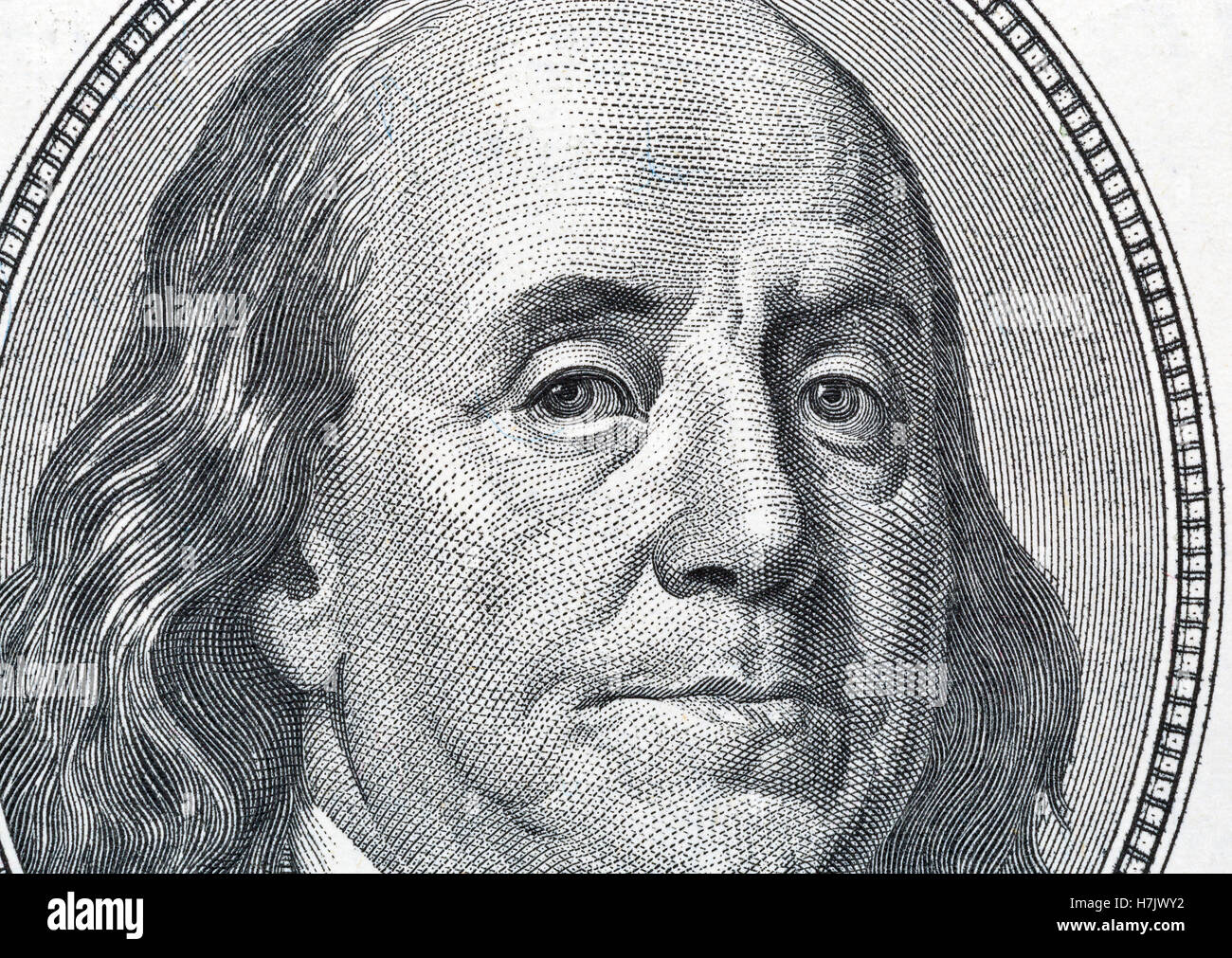 Il presidente statunitense Benjamin Franklin ritratto su un centinaio di dollari frammento macro Foto Stock