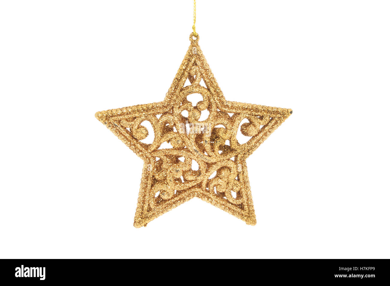 Oro glitter stella di Natale isolata contro bianco Foto Stock