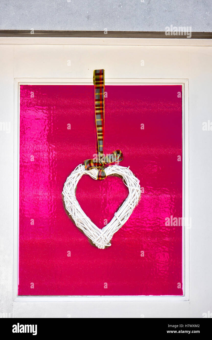 Amore cuore appeso su una porta Bruges Belgio Foto Stock