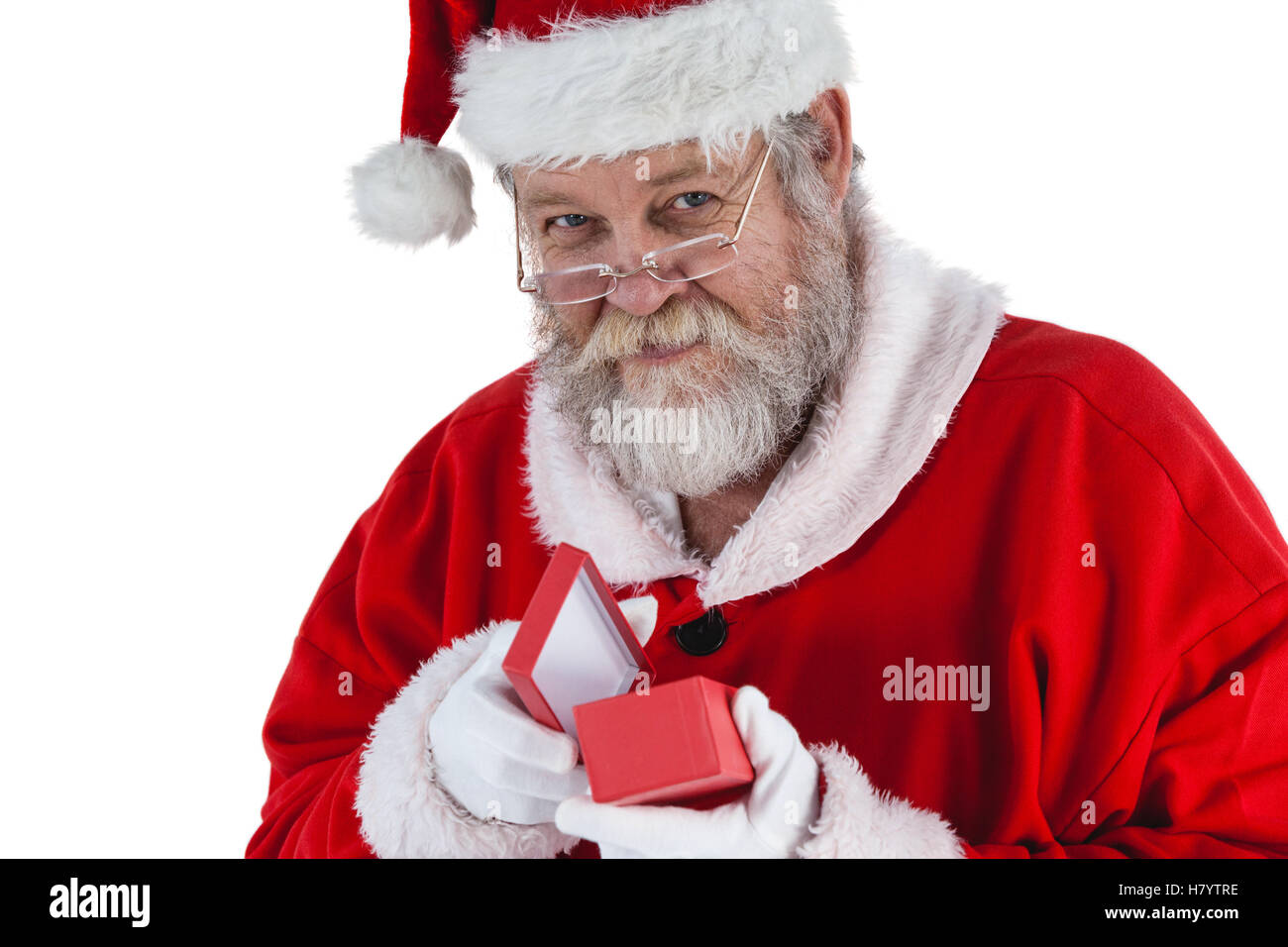 Santa Claus apertura di una confezione regalo Foto Stock