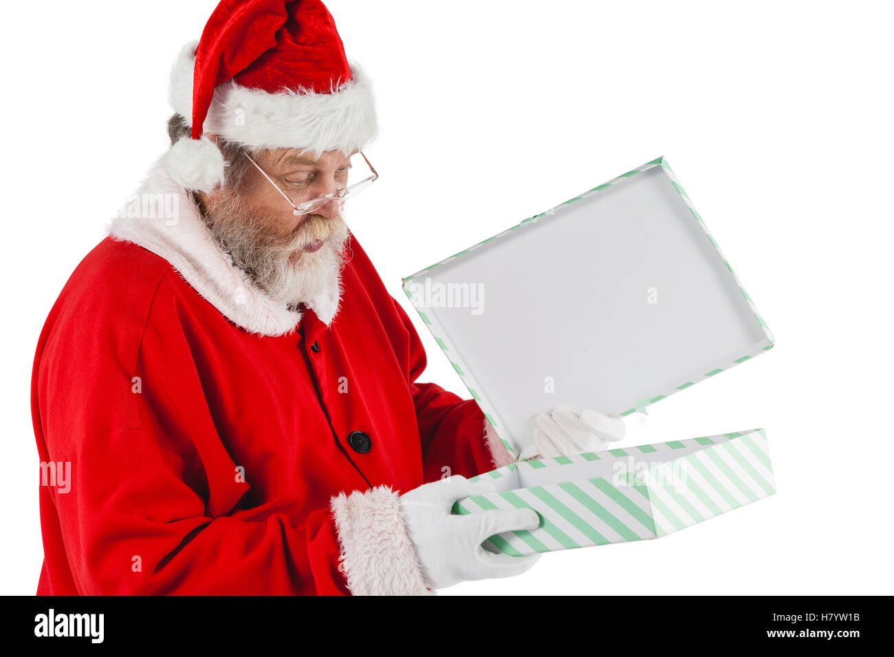 Santa Claus apertura di una confezione regalo Foto Stock