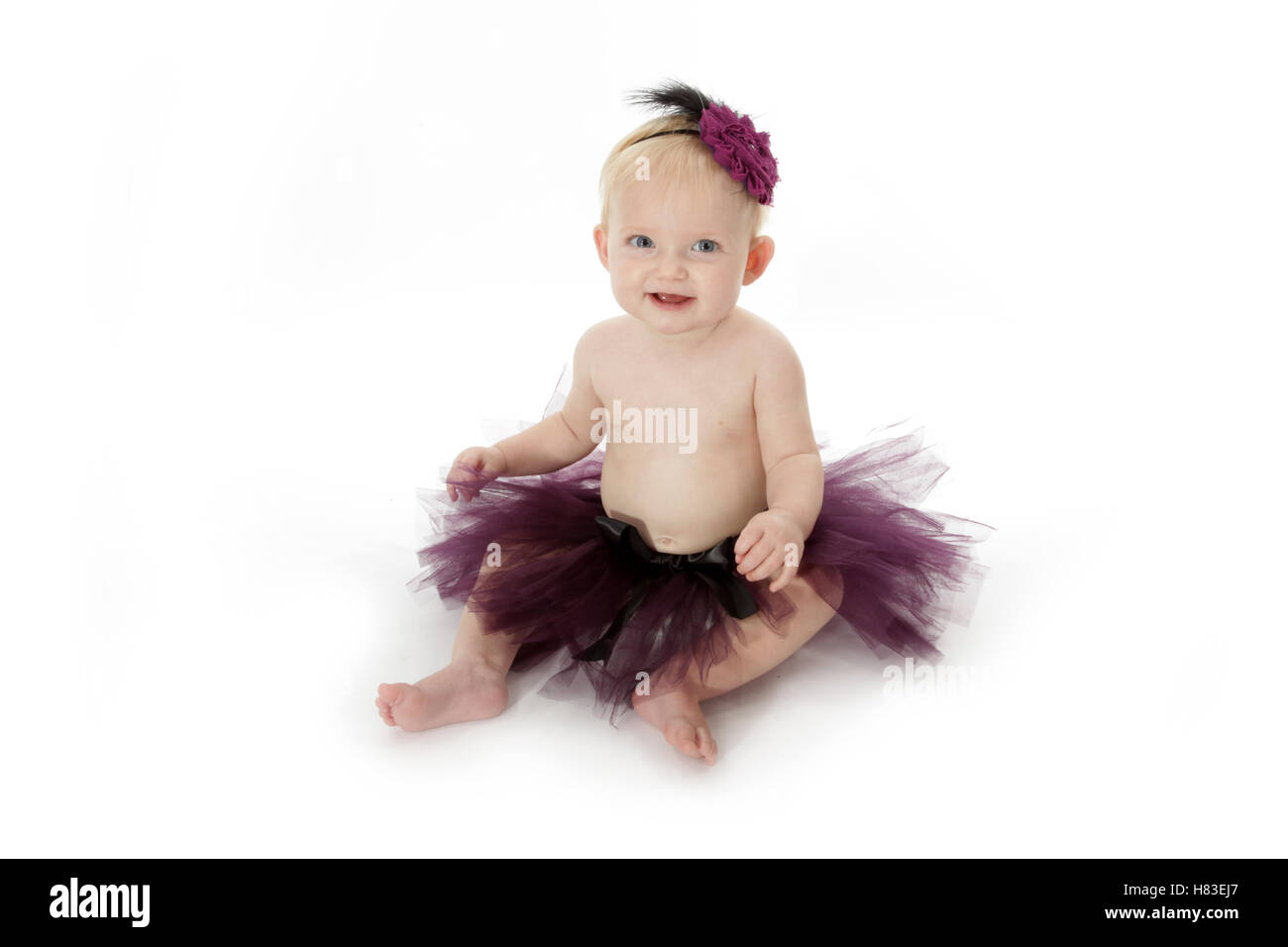Happy Baby girl in viola tutu studio di fotografia fotografia Foto Stock