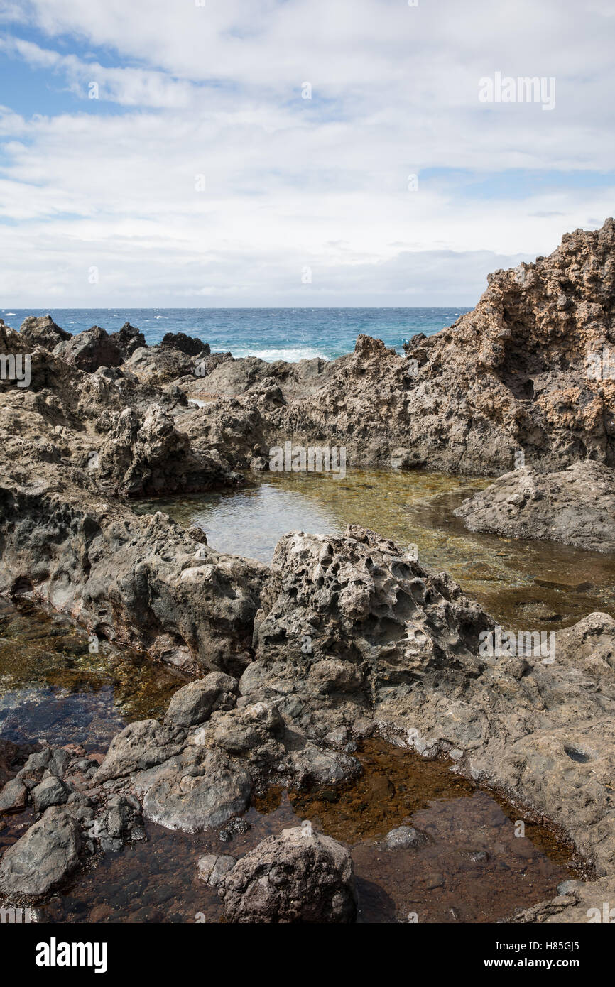 Le rocce vulcaniche in Playa San Juan - Tenerife Foto Stock