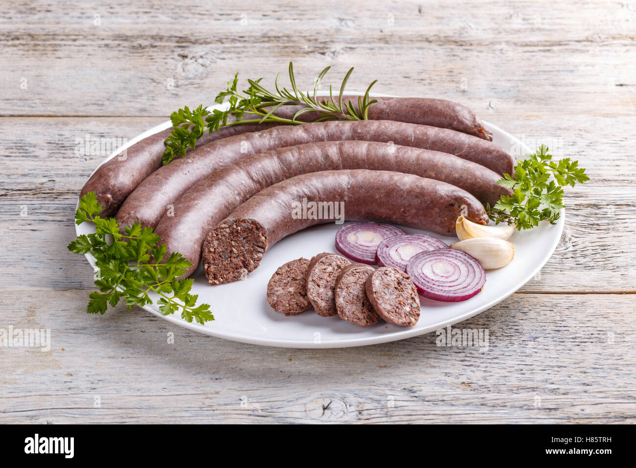 Gustose materie black pudding con cipolla Foto Stock