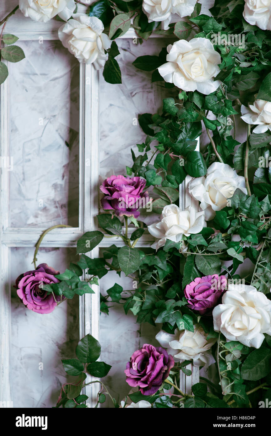 Fiori in un telaio sulla parete per decorazioni per matrimoni Foto Stock