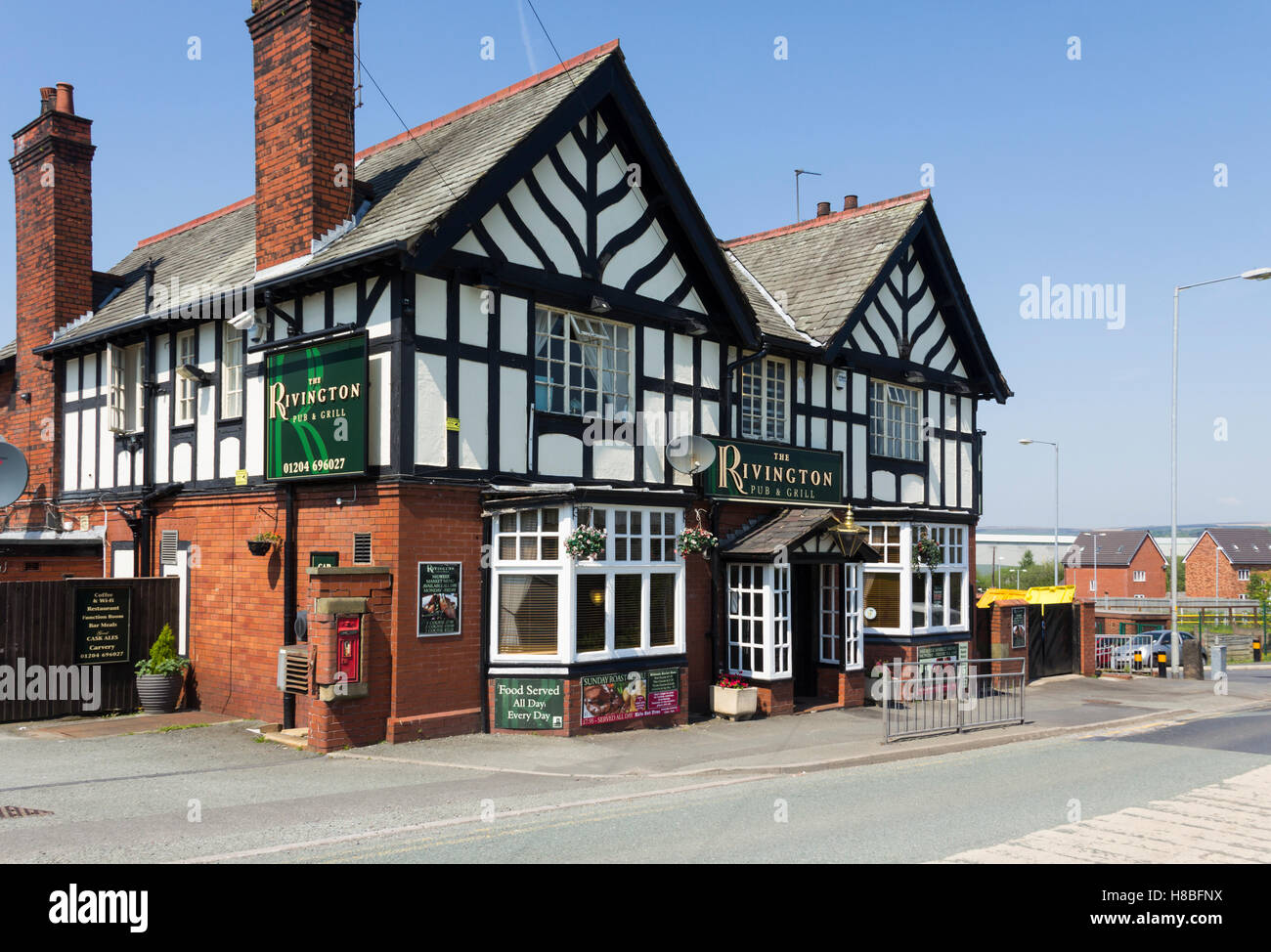 Il Rivington pub e ristorante grill, precedentemente la Ridgeway bracci, sulla strada della stazione a Blackrod, vicino a Bolton, Lancashire. Foto Stock