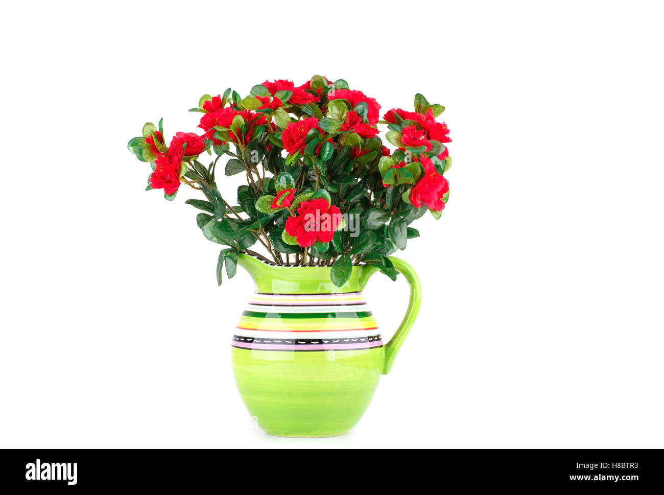In tessuto rosso fiori in vaso isolato su sfondo bianco. Foto Stock