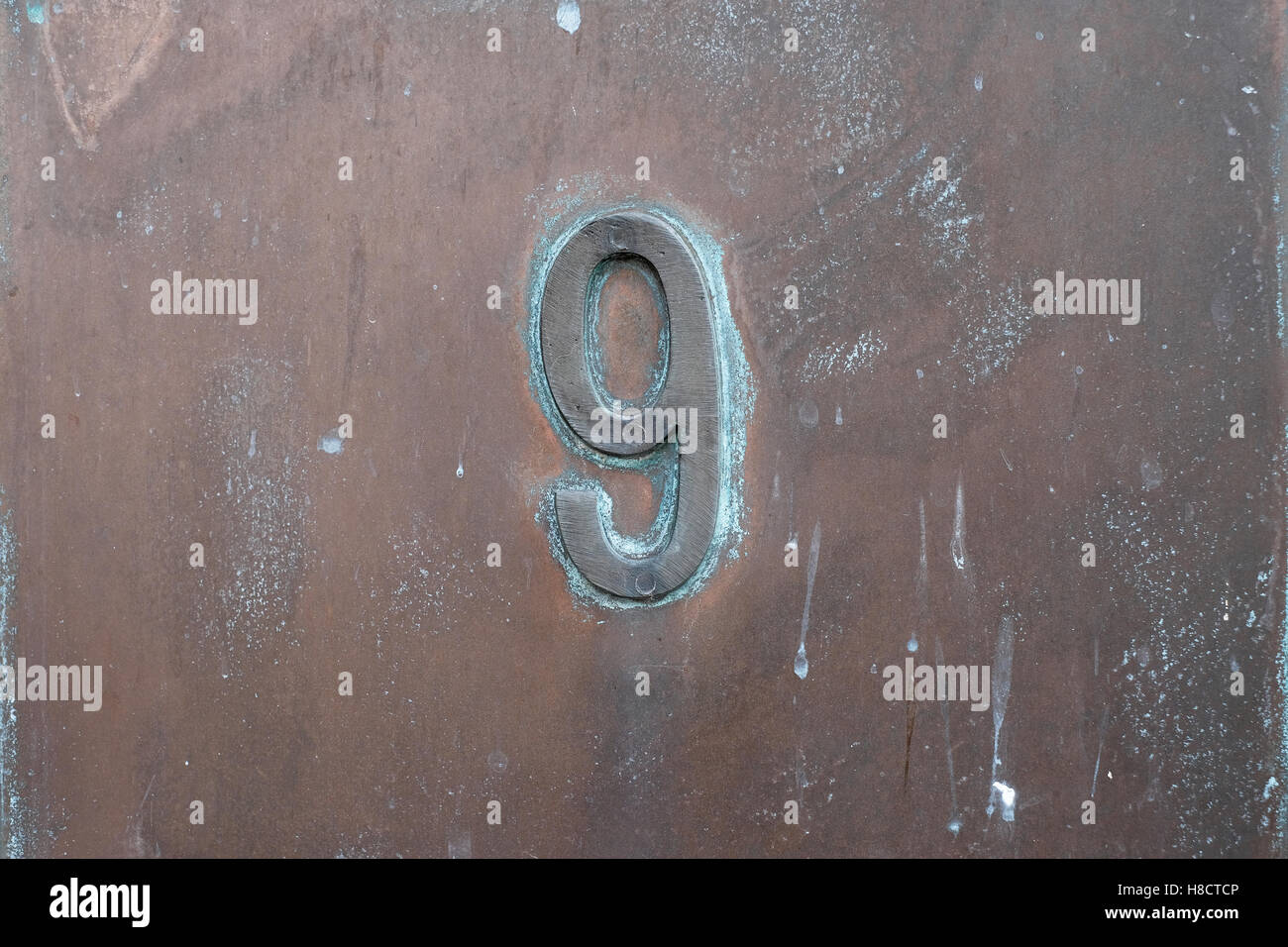 Numero Nove in metallo, 9 Foto Stock