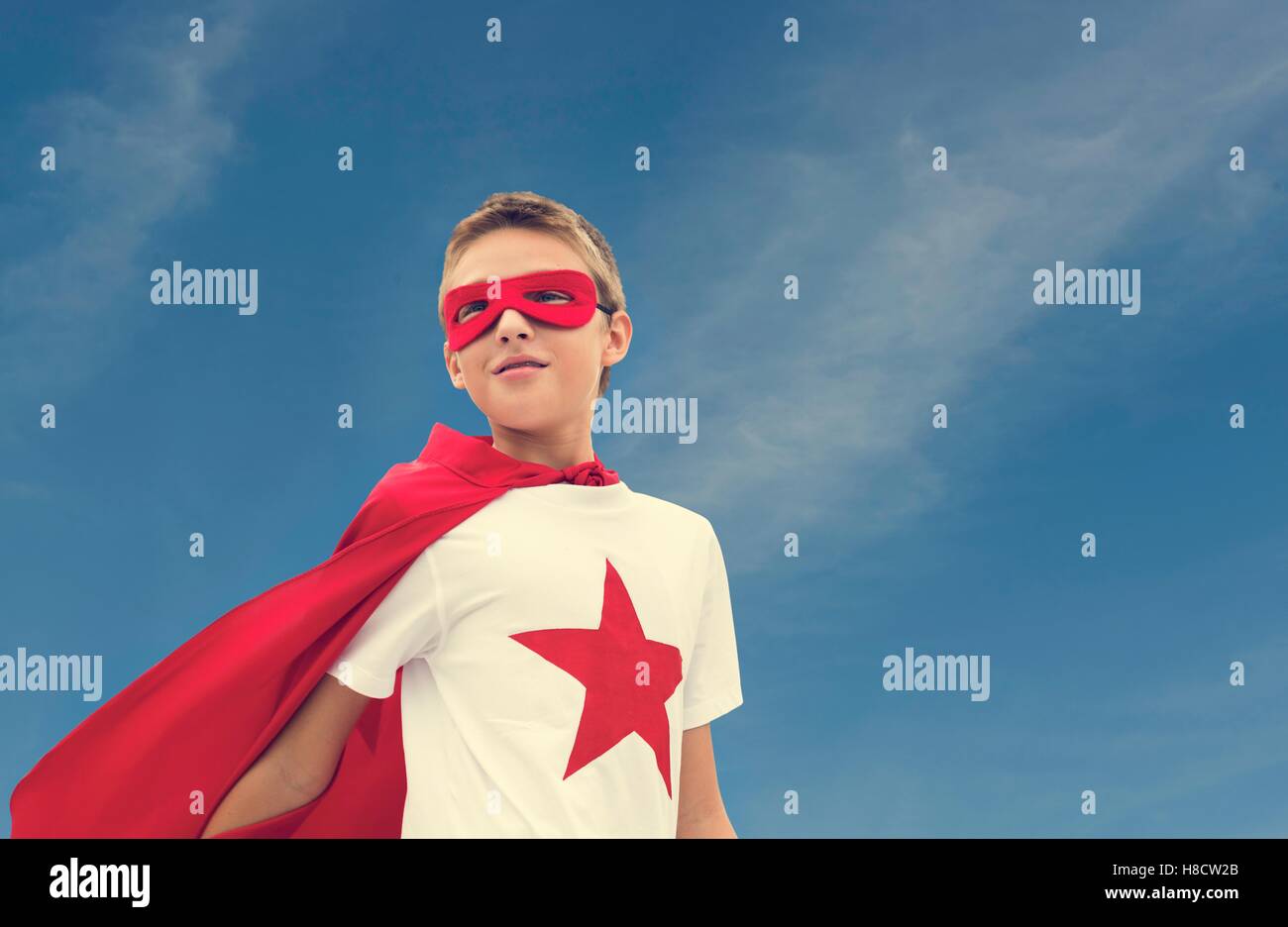 Il supereroe Boy immaginazione libertà felicità Concept Foto Stock