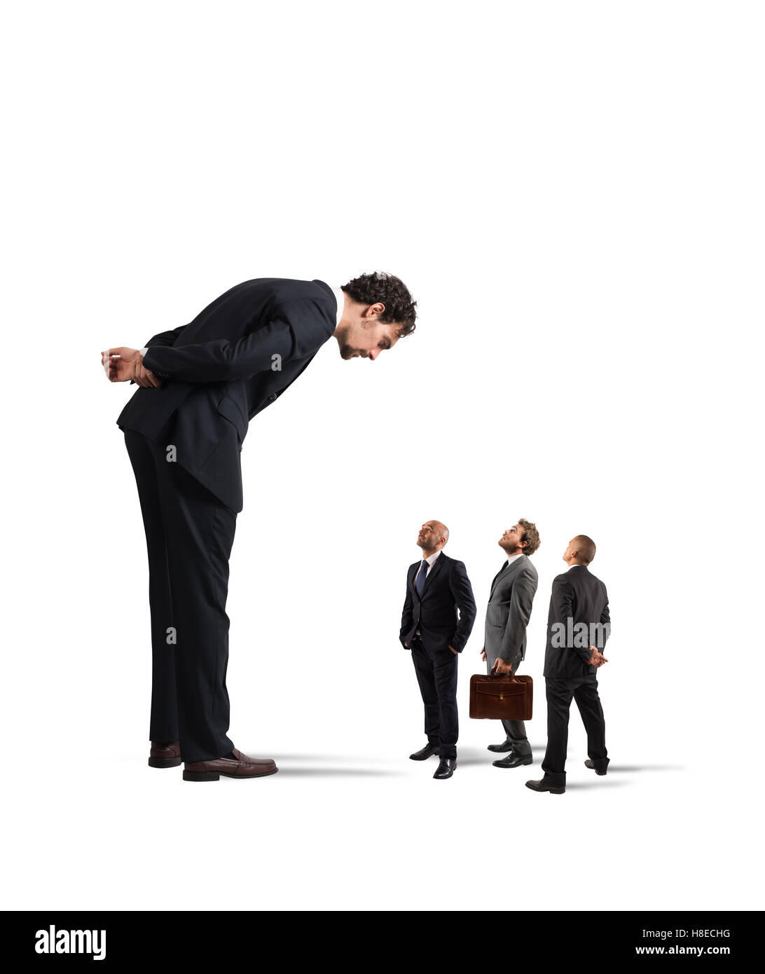 Il boss gravi umilia i suoi dipendenti Foto Stock