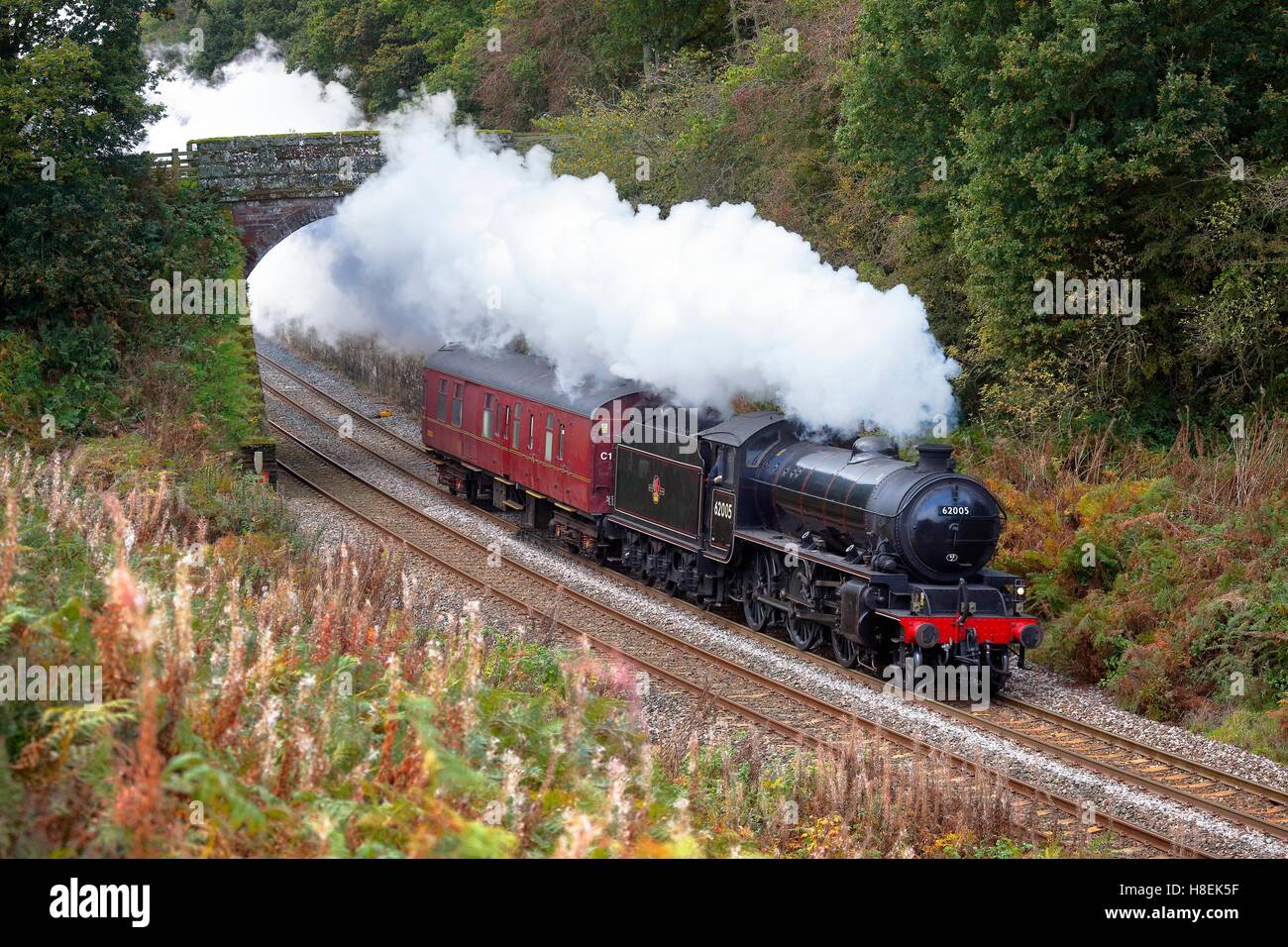 Treno a vapore LNER 62005 Signore delle isole. Cowran tagliare, Cowran Taglio, Brampton, Newcastle & Ferroviaria di Carlisle, Cumbria, Inghilterra. Foto Stock