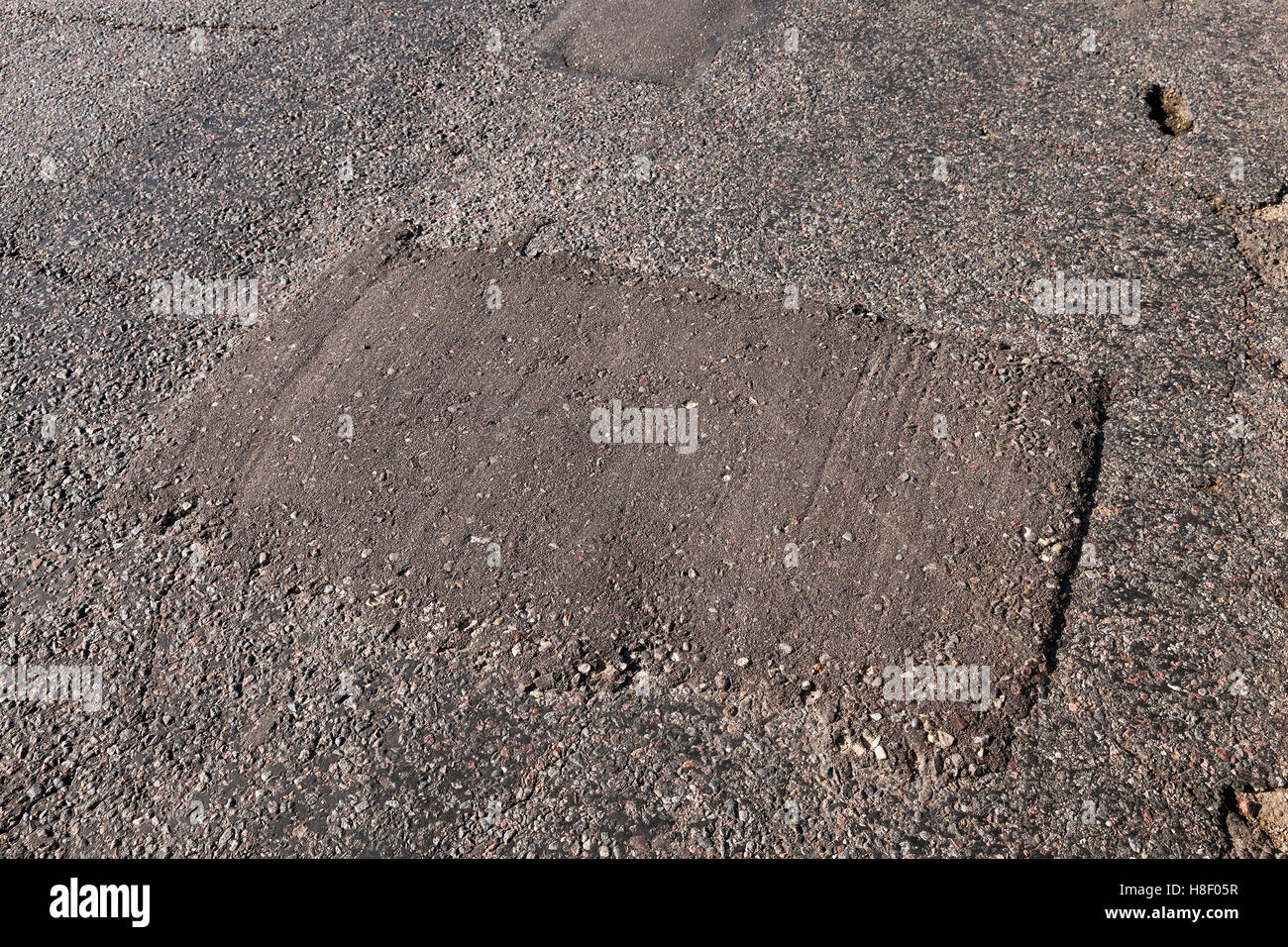 Rottura parte della strada Foto Stock
