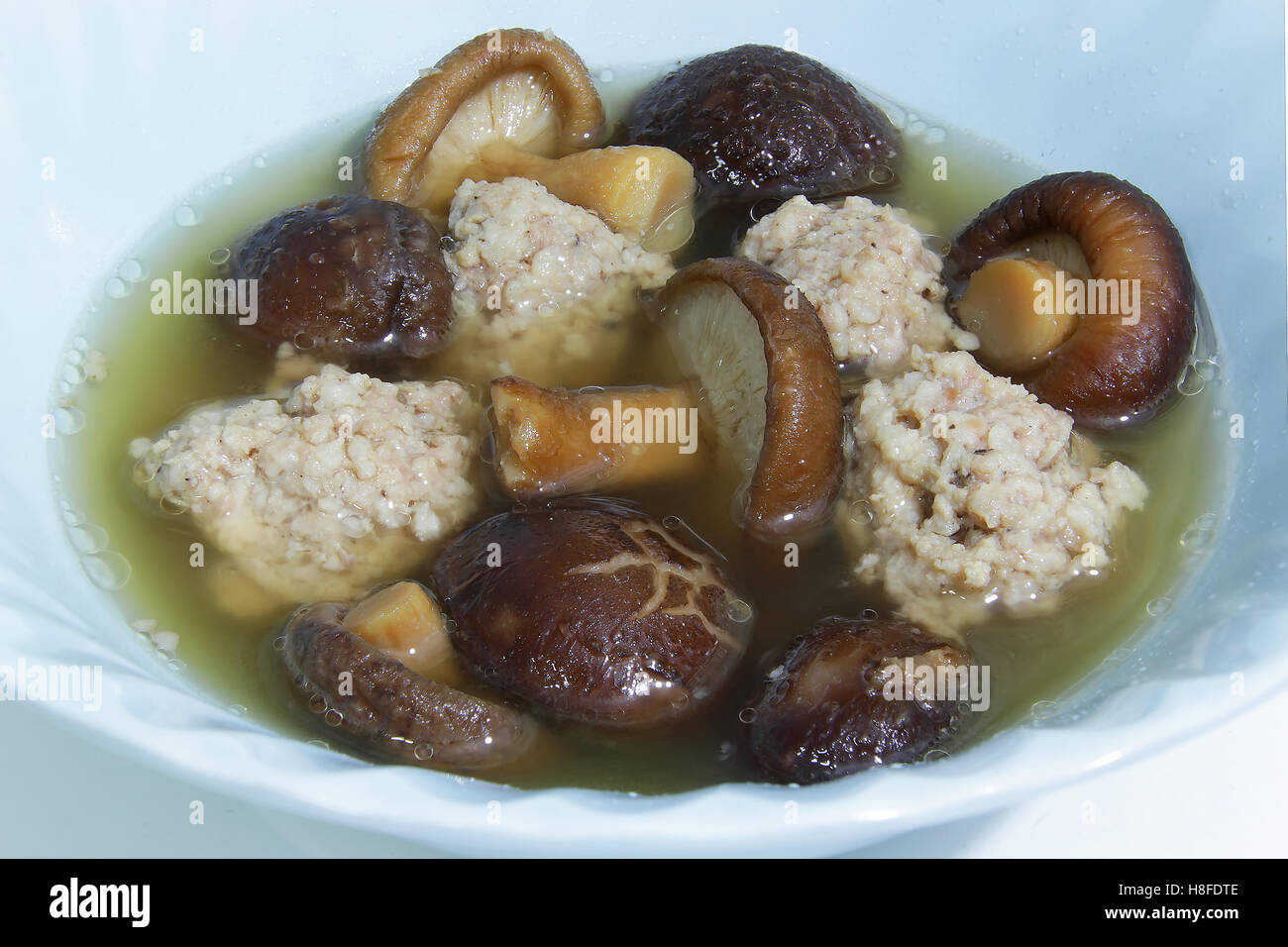 Close Up Stile cinese minestra calda - di carne macinata di maiale con Funghi Shitake Foto Stock