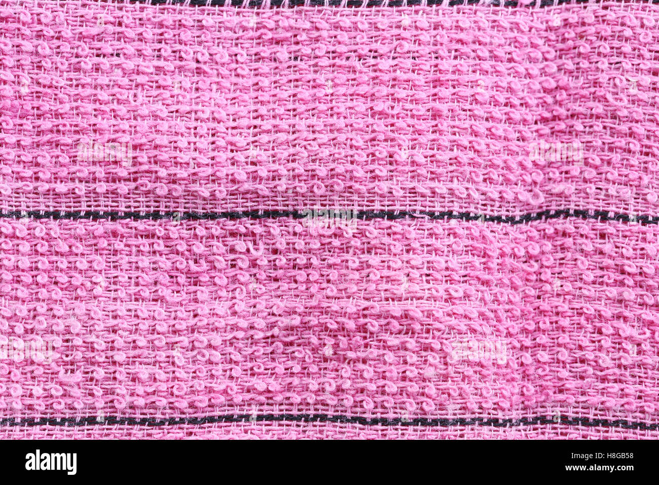 Tessuto rosa texture di tessili per la progettazione di sfondo astratto. Foto Stock