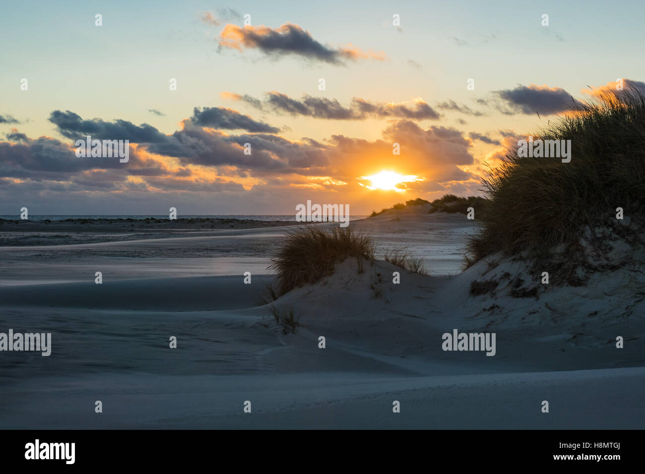 Tramonto sulla costa del Mare del Nord dell'isola Amrum, Germania Foto Stock