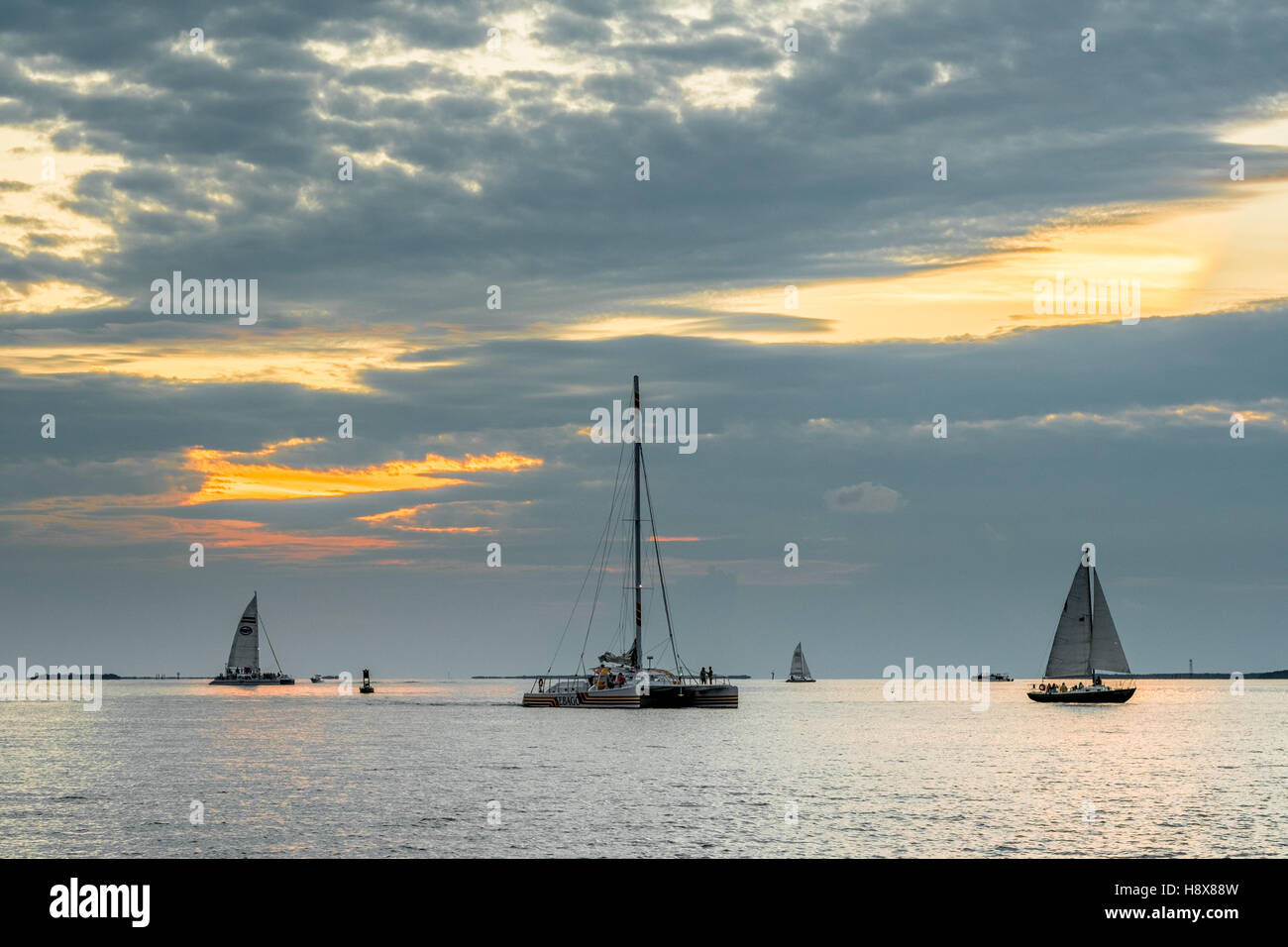 Barche a vela off la riva occidentale del key west al tramonto cool calma facile vivere jimmy buffet Foto Stock