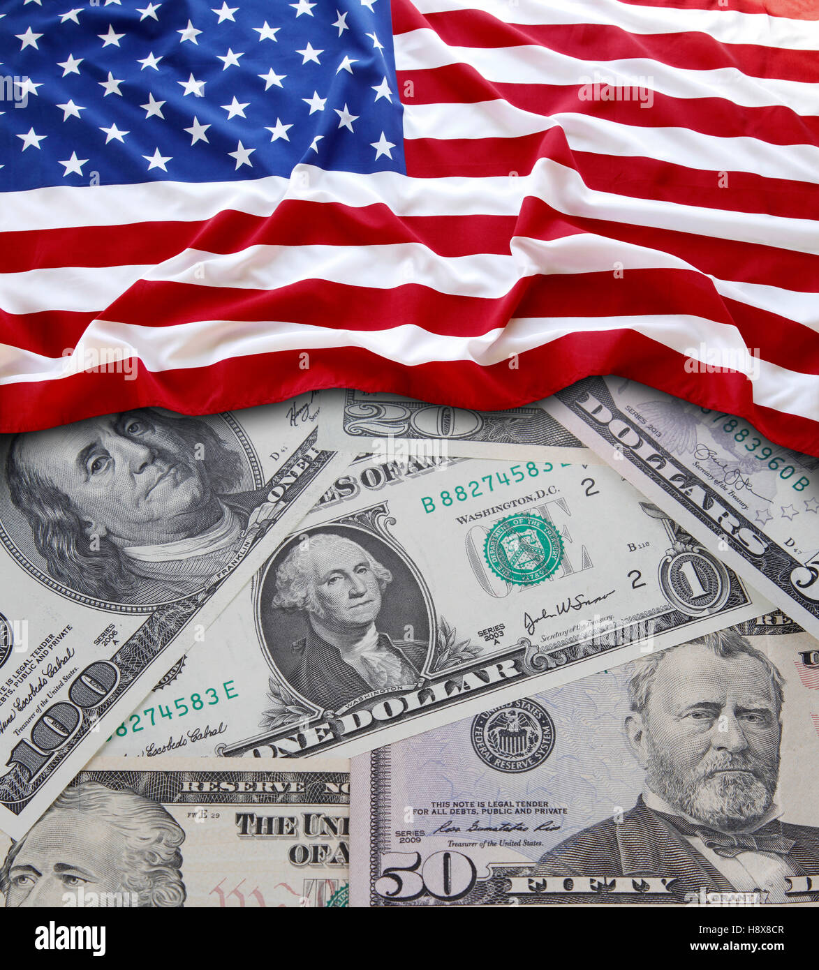 Bandiera americana sulle banconote assortiti Foto Stock