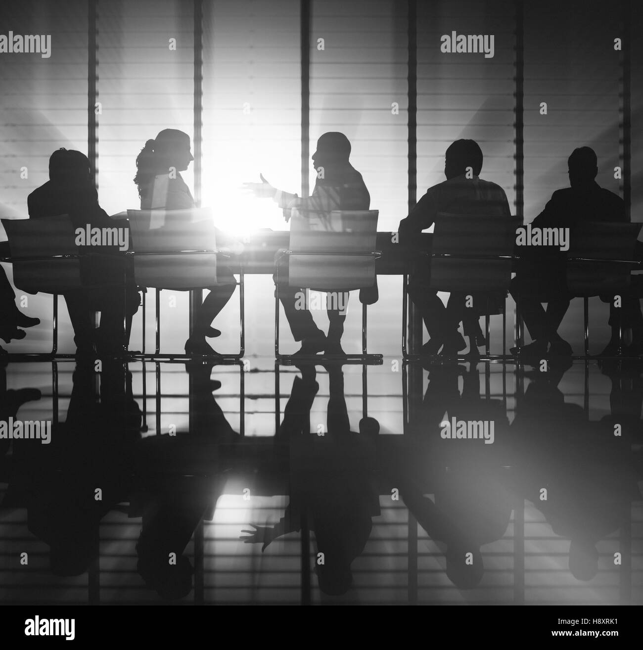 Un gruppo di persone di Business Meeting back lit Concept Foto Stock
