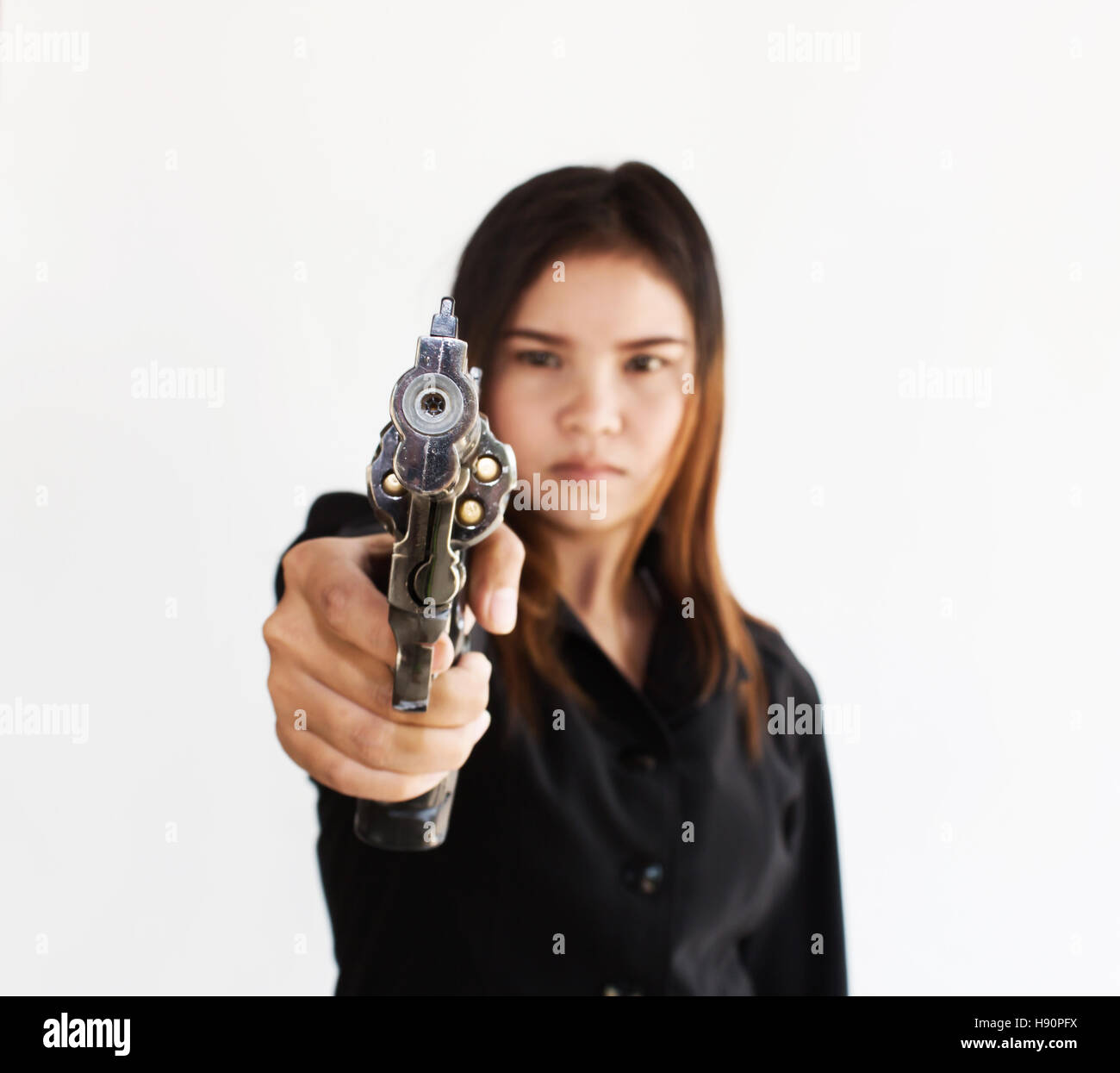 Business donna con la pistola Foto Stock