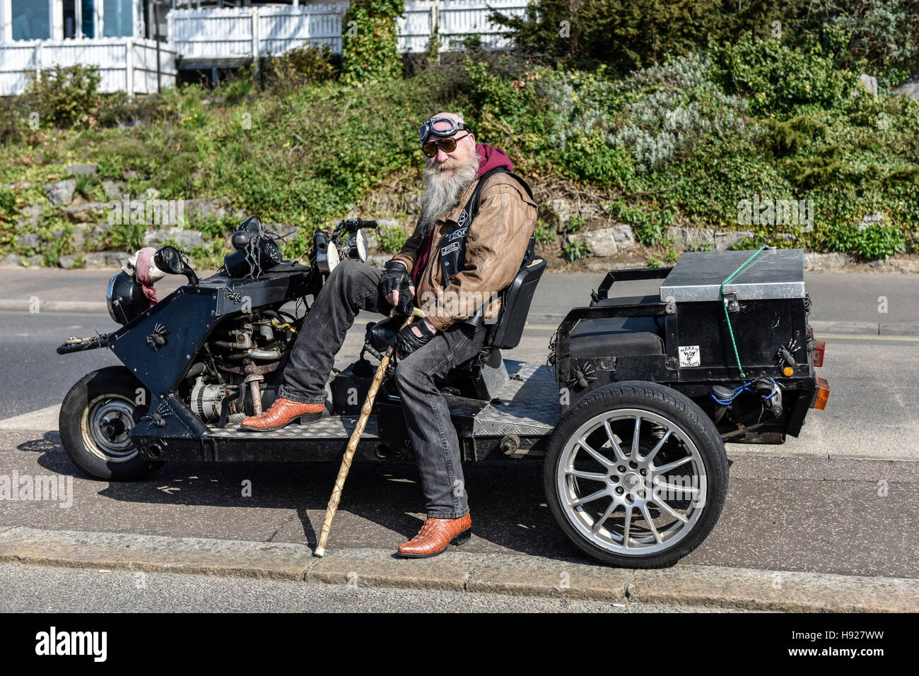 Mike meglio noto come Doc assiste il Southend Shakedown sul suo unico trike. Foto Stock