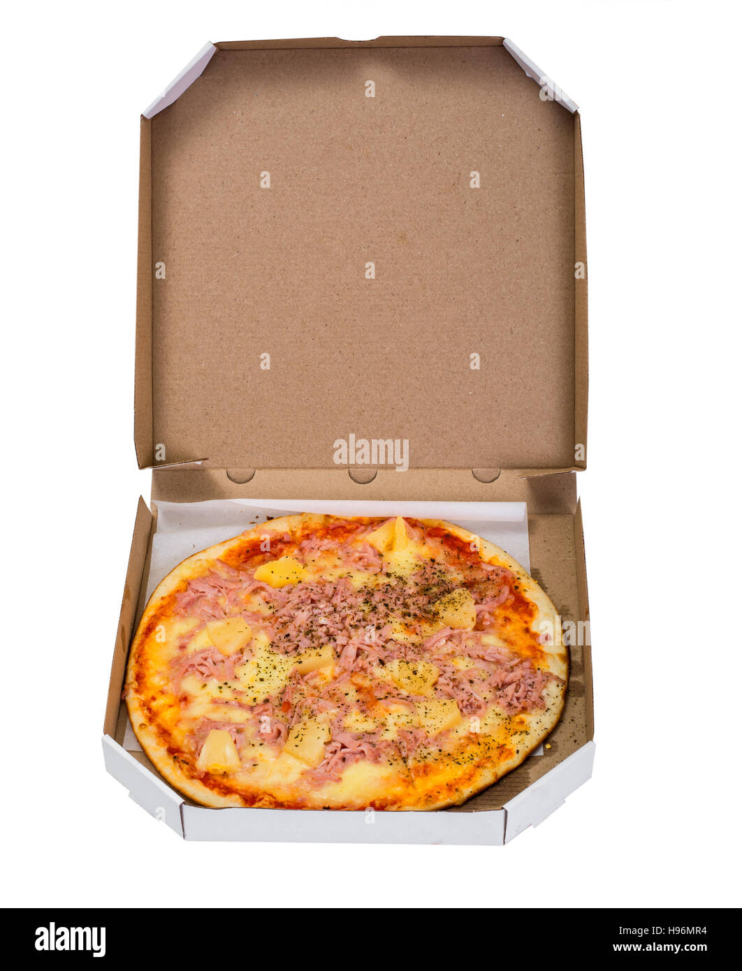 Hawaiian Pizza su una sottile sfoglia con prosciutto, carne e ananas. Street Fast Food. Foto Studio Foto Stock