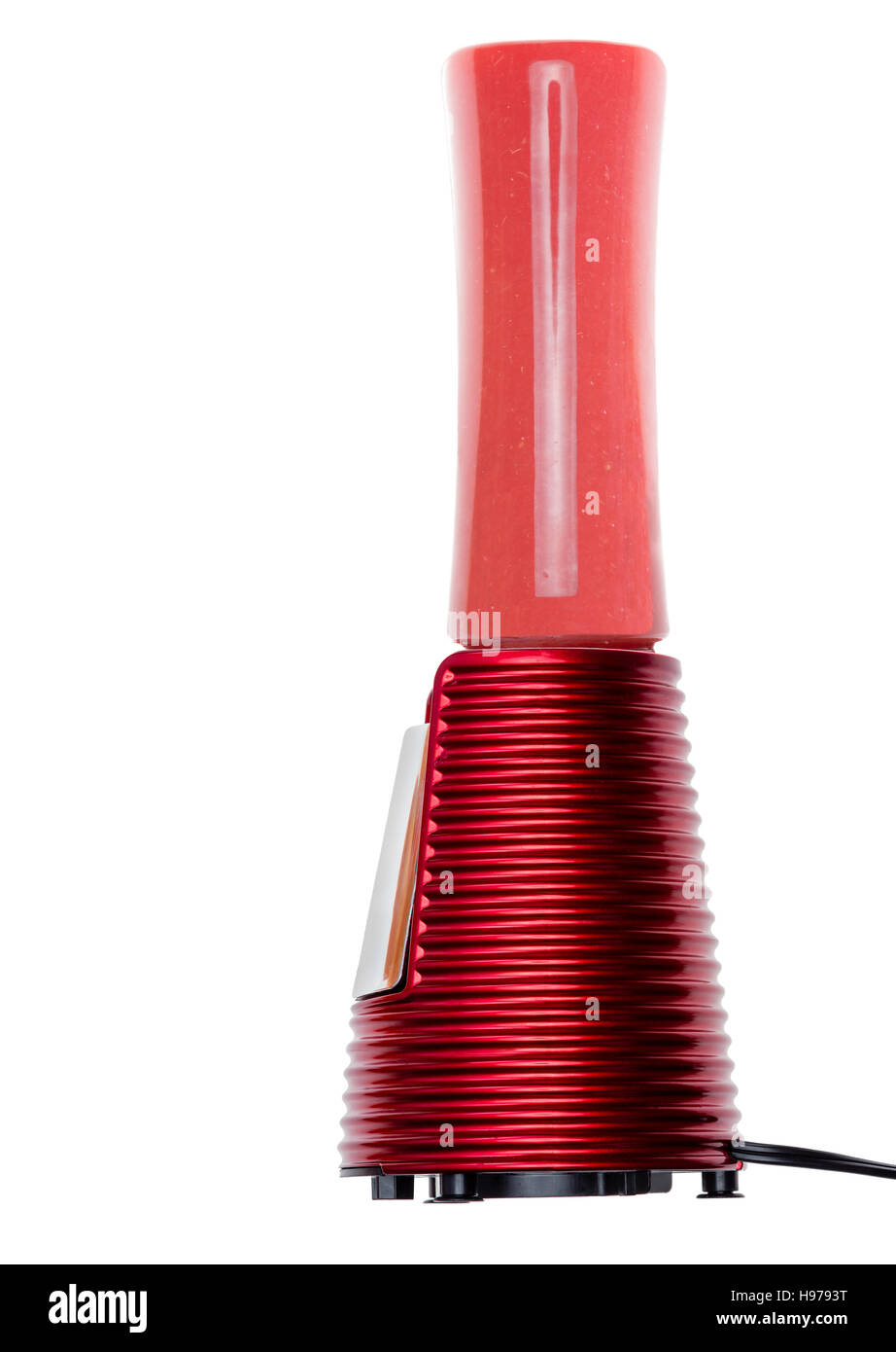 Squizeed fresco il succo di pompelmo Pieno, elegante elettrodomestico con base in metallo e colorate di rosso fatto per preparare frullati di frutta Foto Stock