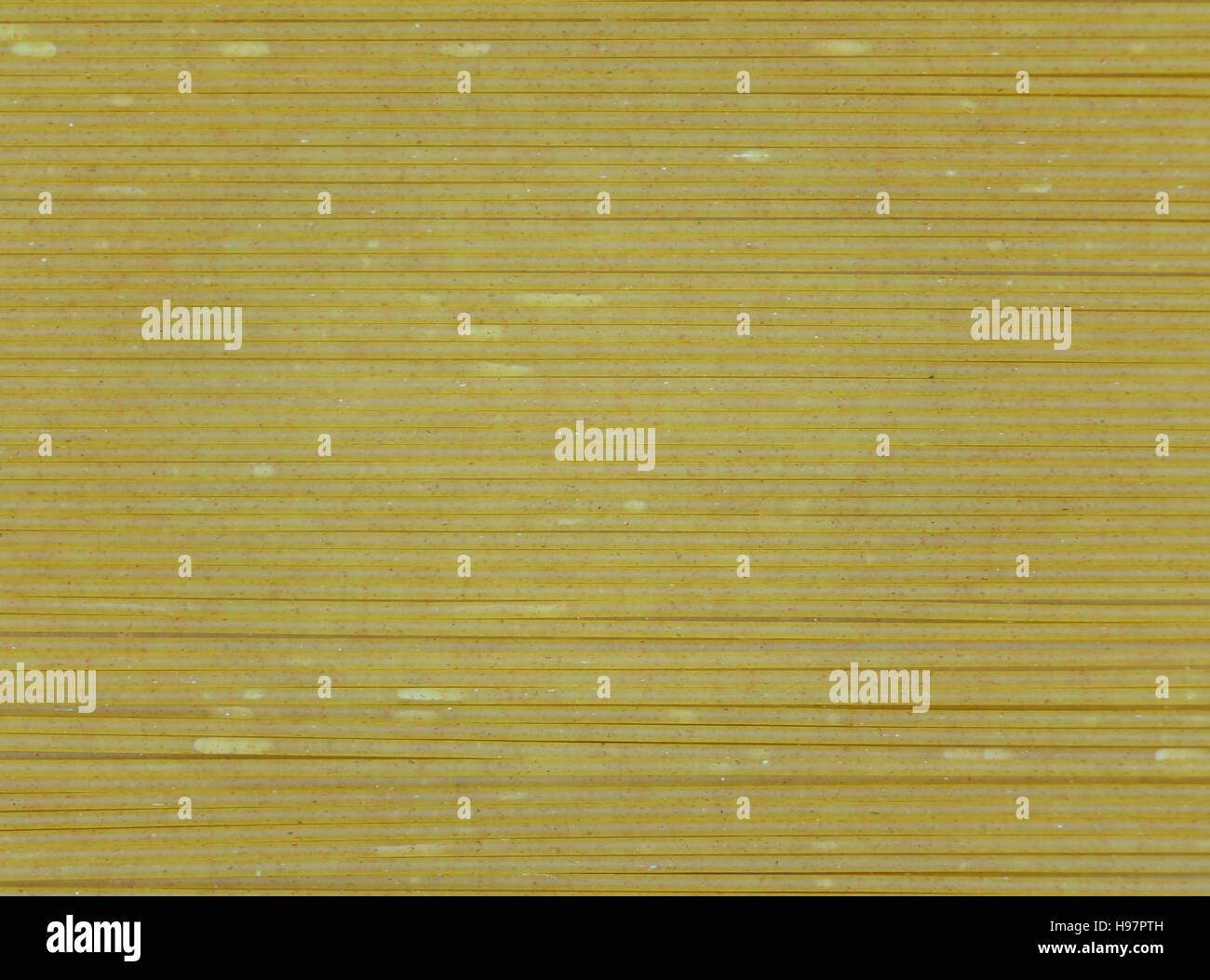 Close-up di tutta la cruda spaghetti di frumento, per la tessitura, sfondo Foto Stock