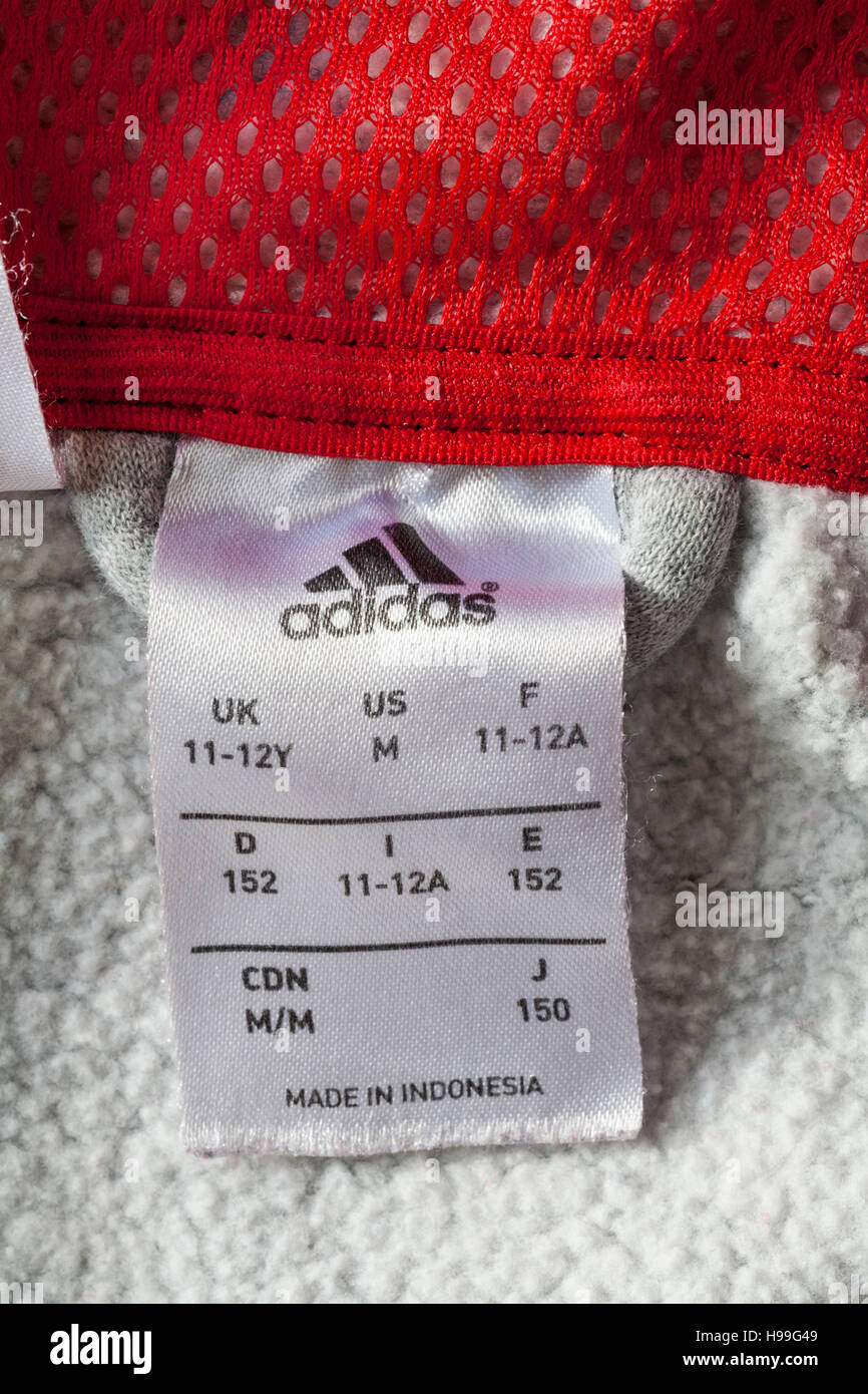 Etichetta di adidas in felpa con cappuccio realizzata in Indonesia -  venduti nel Regno Unito Regno Unito, Gran Bretagna Foto stock - Alamy