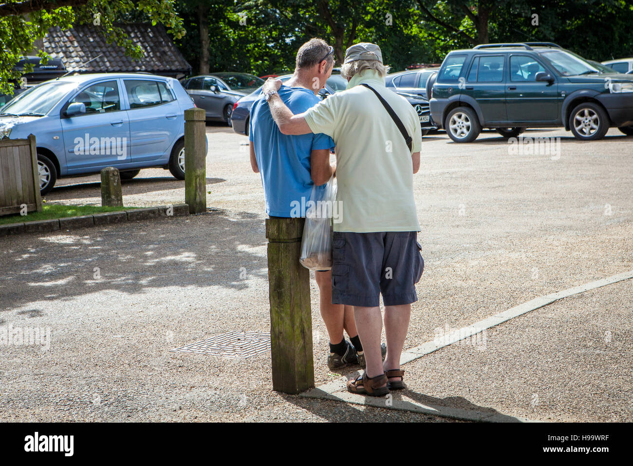 Padre con abito figlio Foto Stock