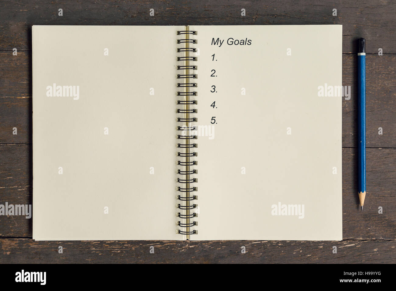 Il concetto di business - vista superiore notebook iscritto i miei obiettivi. Foto Stock